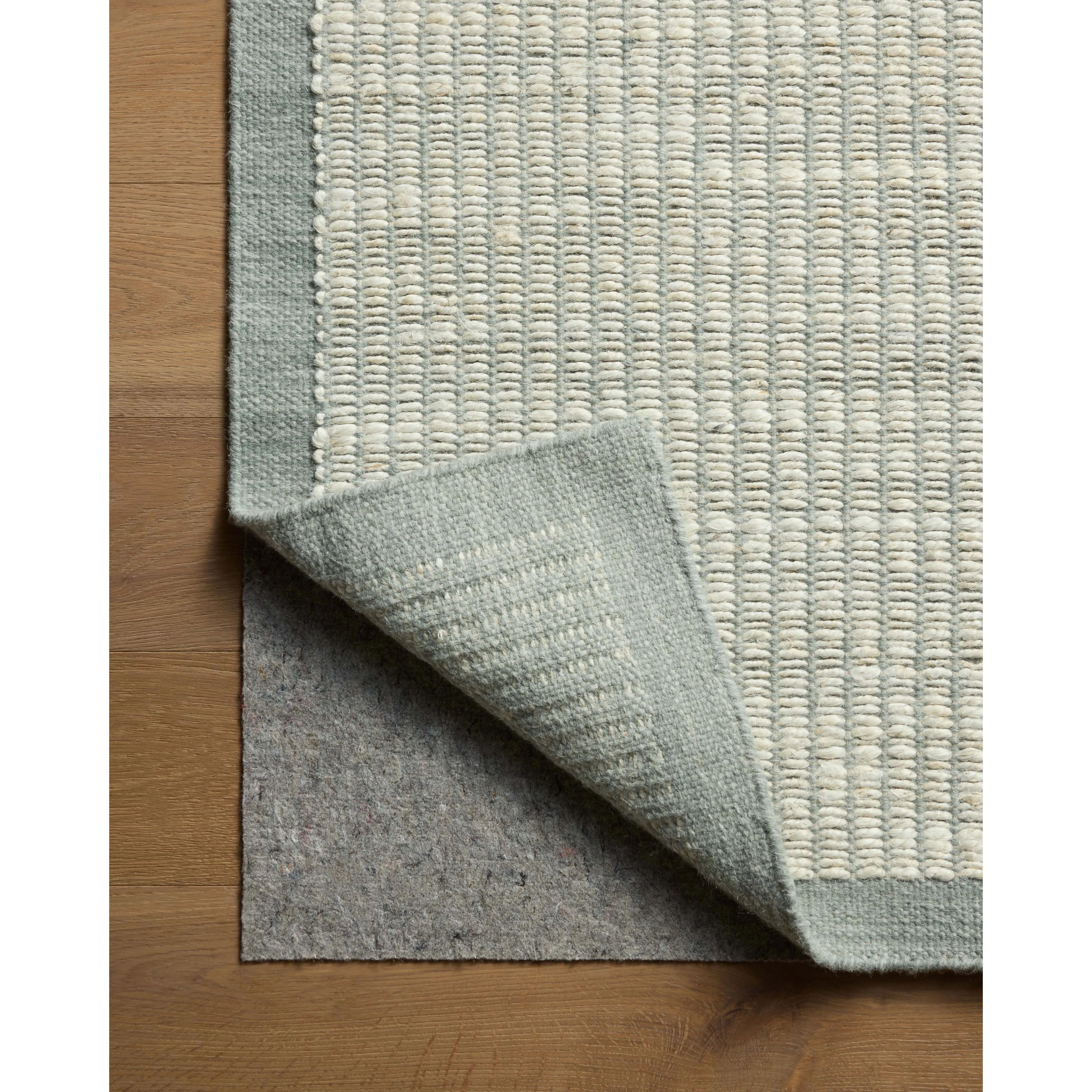 The Lilah Collection by Amber Lewis x Loloi is a hand-woven area rug with the designer’s signature earthy, organic aesthetic. Small details, like the flatweave framing around the rug’s border, add a juxtaposing texture to the ribbed jute and elevate this essential collection for living rooms, dining rooms, and more. Amethyst Home provides interior design, new home construction design consulting, vintage area rugs, and lighting in the Salt Lake City metro area.