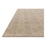 Featuring Amber Lewis x Loloi Marlowe Natural / Sand Rug by Loloi at Amethyst Home. The Marlowe Collection by Amber Lewis x Loloi is a handmade area rug with a coastal-inspired gridded design in natural color palettes. The rugs muted pattern adds understated depth with a durable, thick pile. This collection is hand-loomed of wool in India and Goodweave-certif. Amethyst Home provides interior design, new home construction design consulting, vintage area rugs, and lighting in the Houston metro area.