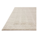 The Monty Collection by Amber Lewis x Loloi is a modern interpretation of richly piled Moroccan rugs in a refreshingly neutral color palette. The rugs abstract designs create a high-low texture in the pile for feet to sink into. Amethyst Home provides interior design, new home construction design consulting, vintage area rugs, and lighting in the Los Angeles metro area.