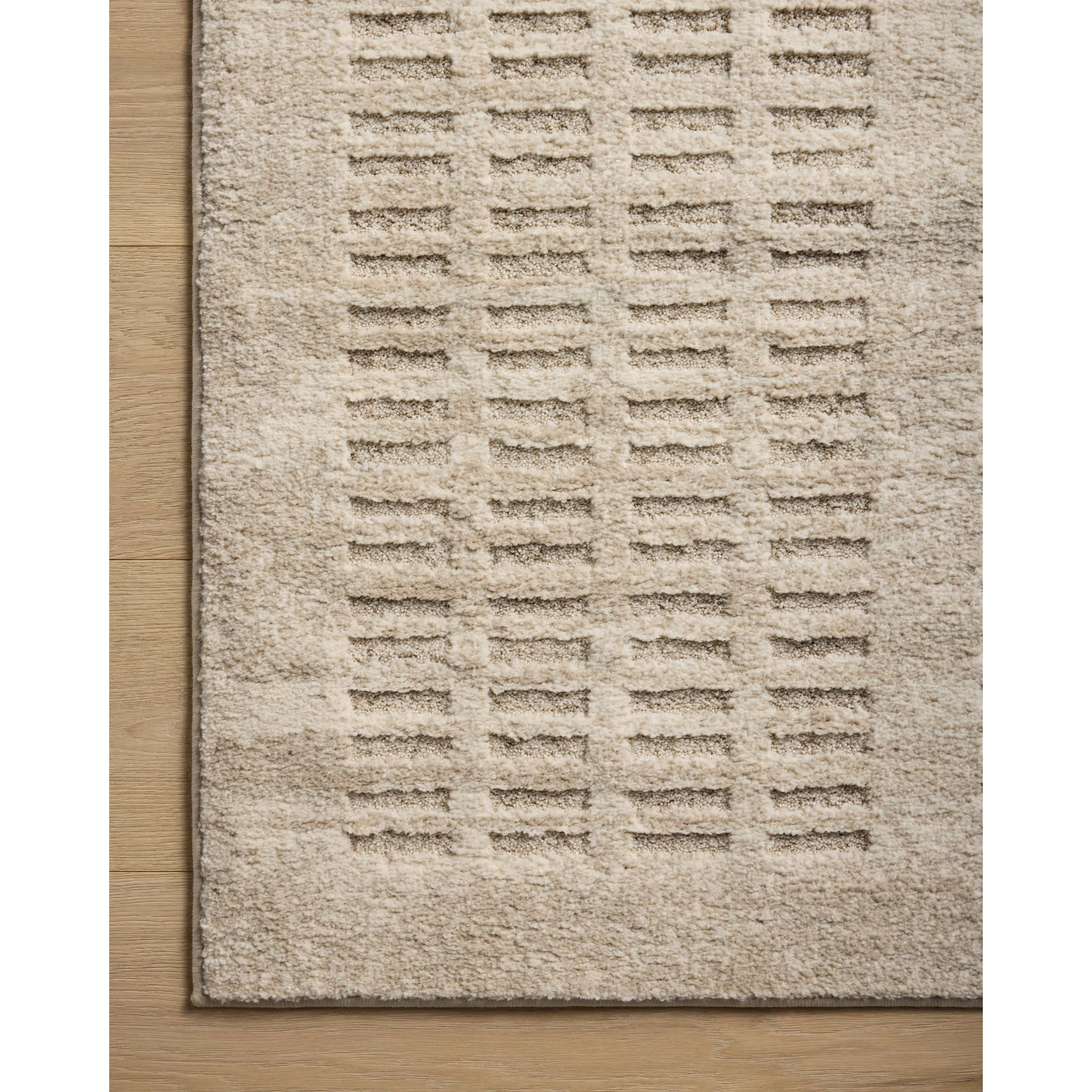 The Monty Collection by Amber Lewis x Loloi is a modern interpretation of richly piled Moroccan rugs in a refreshingly neutral color palette. The rugs abstract designs create a high-low texture in the pile for feet to sink into. Amethyst Home provides interior design, new home construction design consulting, vintage area rugs, and lighting in the Washington metro area.