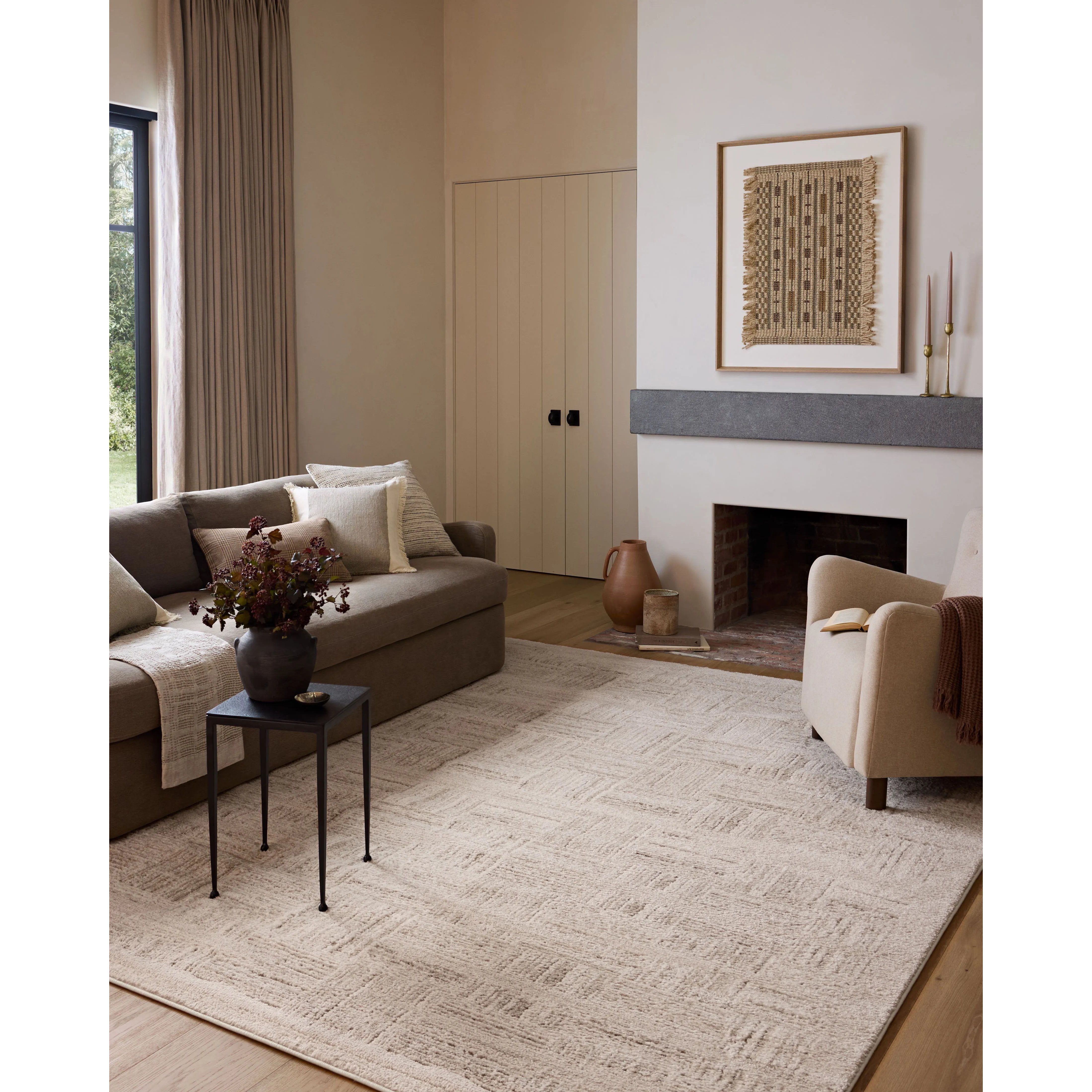 The Monty Collection by Amber Lewis x Loloi is a modern interpretation of richly piled Moroccan rugs in a refreshingly neutral color palette. The rugs abstract designs create a high-low texture in the pile for feet to sink into. Amethyst Home provides interior design, new home construction design consulting, vintage area rugs, and lighting in the Charlotte metro area.