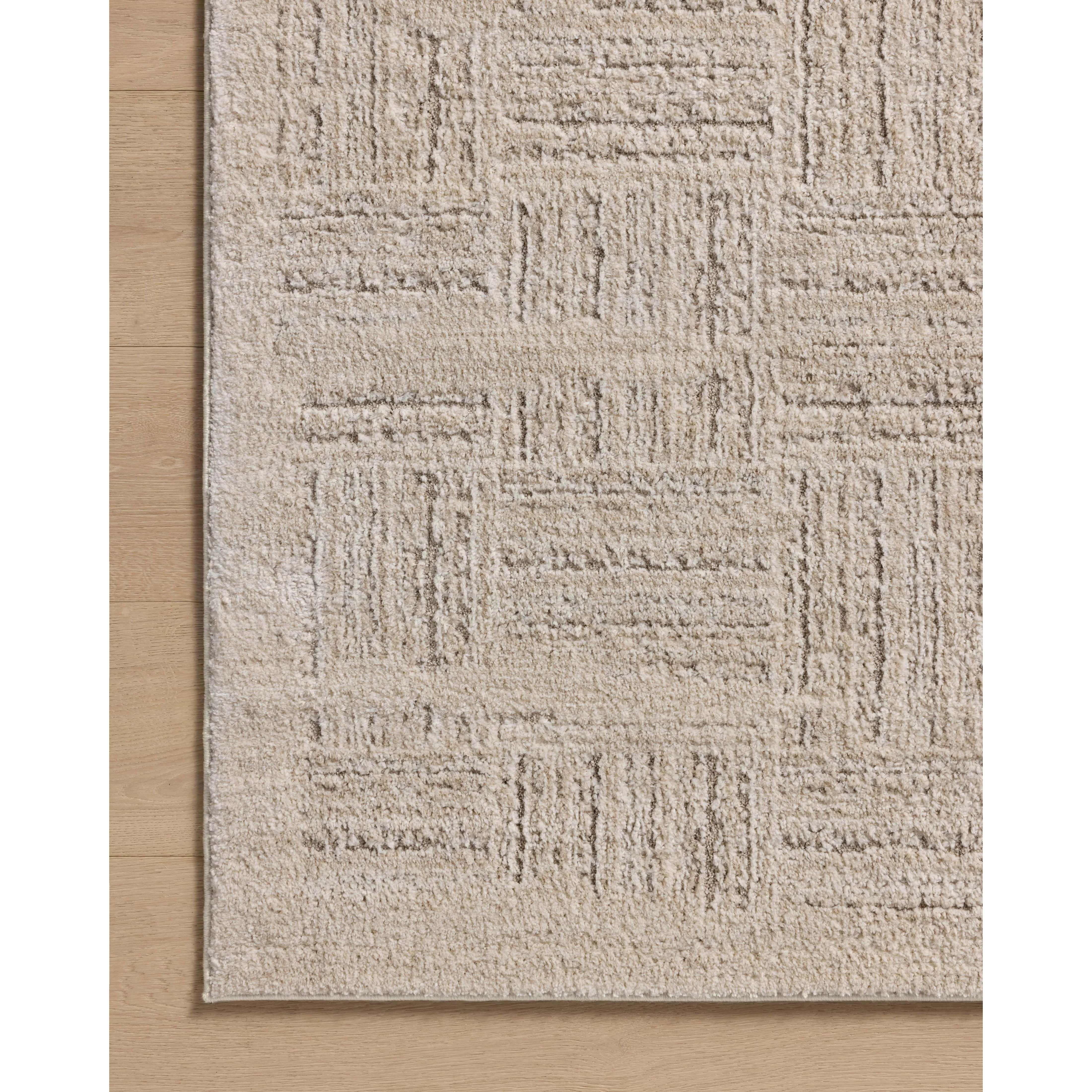 The Monty Collection by Amber Lewis x Loloi is a modern interpretation of richly piled Moroccan rugs in a refreshingly neutral color palette. The rugs abstract designs create a high-low texture in the pile for feet to sink into. Amethyst Home provides interior design, new home construction design consulting, vintage area rugs, and lighting in the Newport Beach metro area.