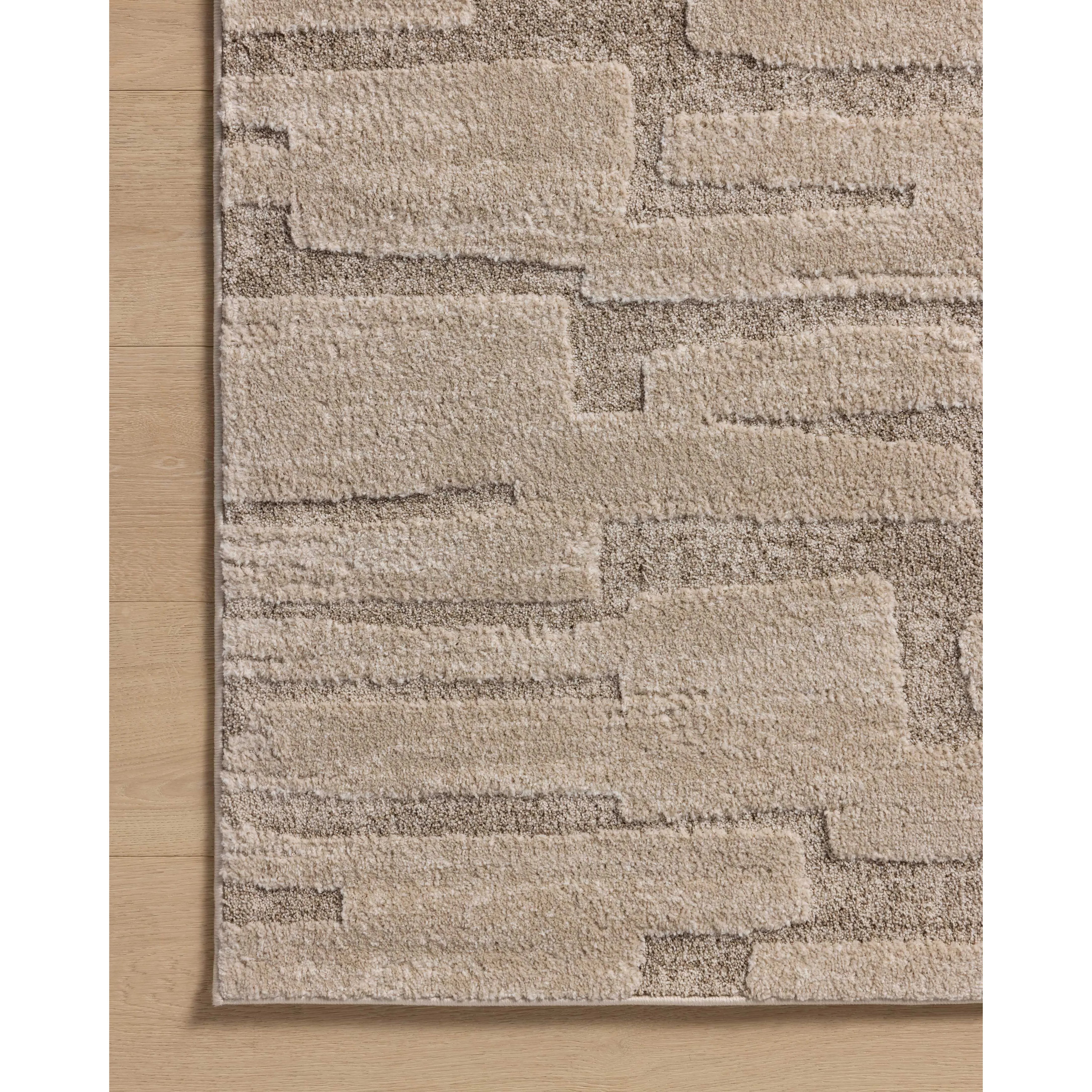 Featuring Amber Lewis x Loloi Monty Taupe / Beige Rug by Loloi at Amethyst Home. The Monty Collection by Amber Lewis x Loloi is a modern interpretation of richly piled Moroccan rugs in a refreshingly neutral color palette. The rugs abstract designs create a high-low texture in the pile for feet to sink into. This collection is power-loomed of easy-to-clean. Amethyst Home provides interior design, new home construction design consulting, vintage area rugs, and lighting in the Washington metro area.