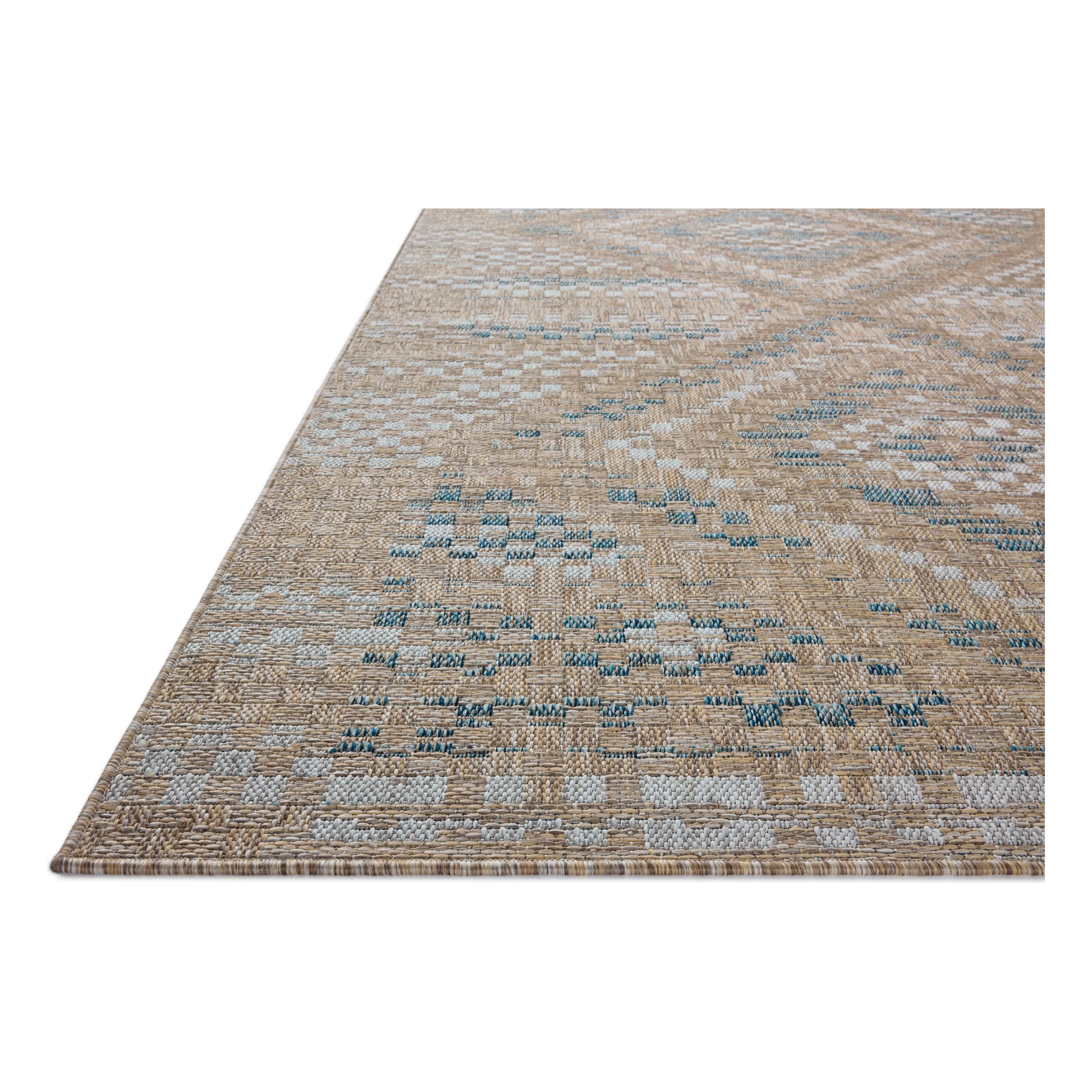 Inspired by the scenic mountain town in California, the Topanga Collection is an indoor/outdoor rug made of durable polypropylene that resembles natural fibers but is much more ready for sun, rain, and high-traffic use. Amethyst Home provides interior design, new home construction design consulting, vintage area rugs, and lighting in the Houston metro area.