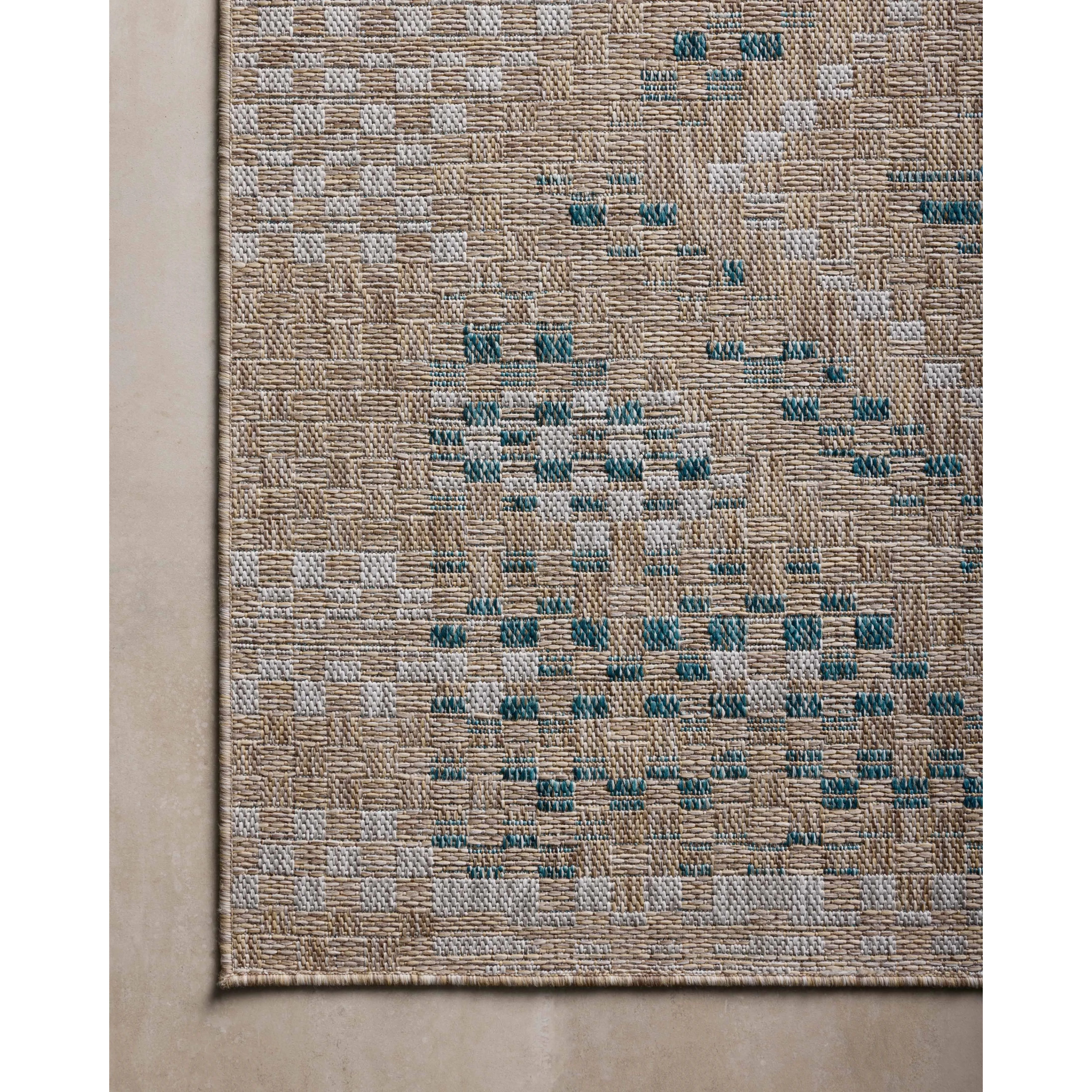 Inspired by the scenic mountain town in California, the Topanga Collection is an indoor/outdoor rug made of durable polypropylene that resembles natural fibers but is much more ready for sun, rain, and high-traffic use. Amethyst Home provides interior design, new home construction design consulting, vintage area rugs, and lighting in the Tampa metro area.