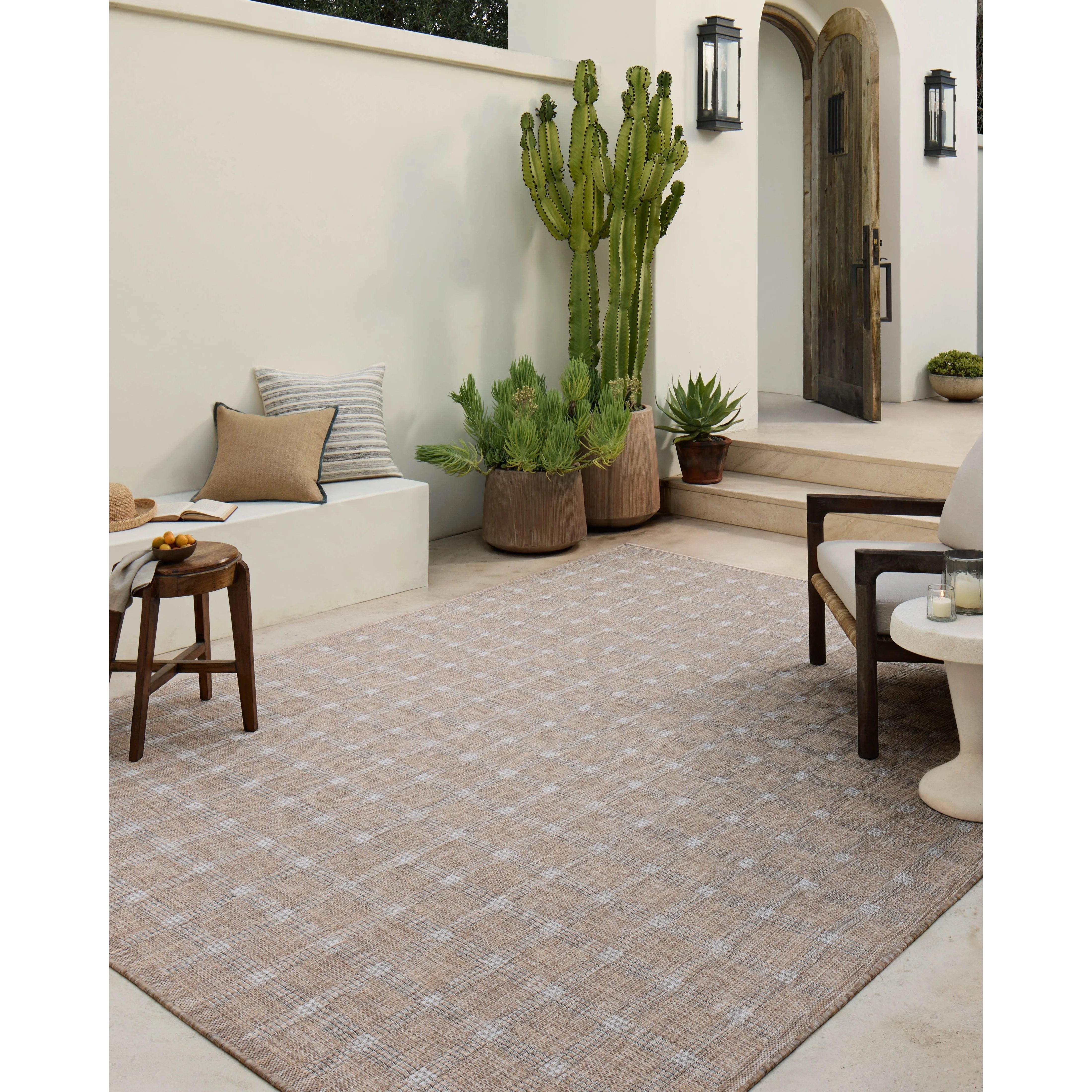 Inspired by the scenic mountain town in California, the Topanga Collection is an indoor/outdoor rug made of durable polypropylene that resembles natural fibers but is much more ready for sun, rain, and high-traffic use. Amethyst Home provides interior design, new home construction design consulting, vintage area rugs, and lighting in the Calabasas metro area.
