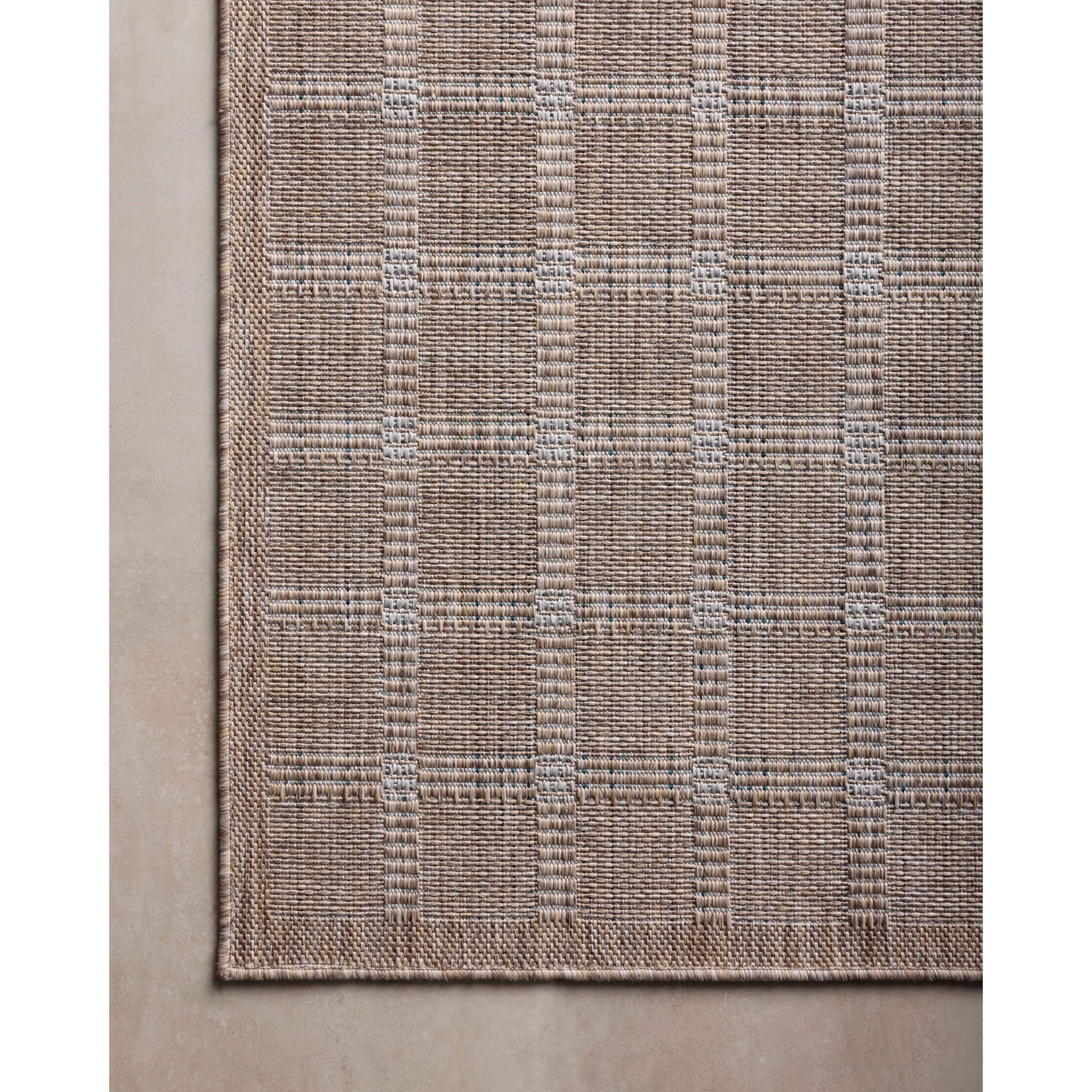 Inspired by the scenic mountain town in California, the Topanga Collection is an indoor/outdoor rug made of durable polypropylene that resembles natural fibers but is much more ready for sun, rain, and high-traffic use. Amethyst Home provides interior design, new home construction design consulting, vintage area rugs, and lighting in the Park City metro area.