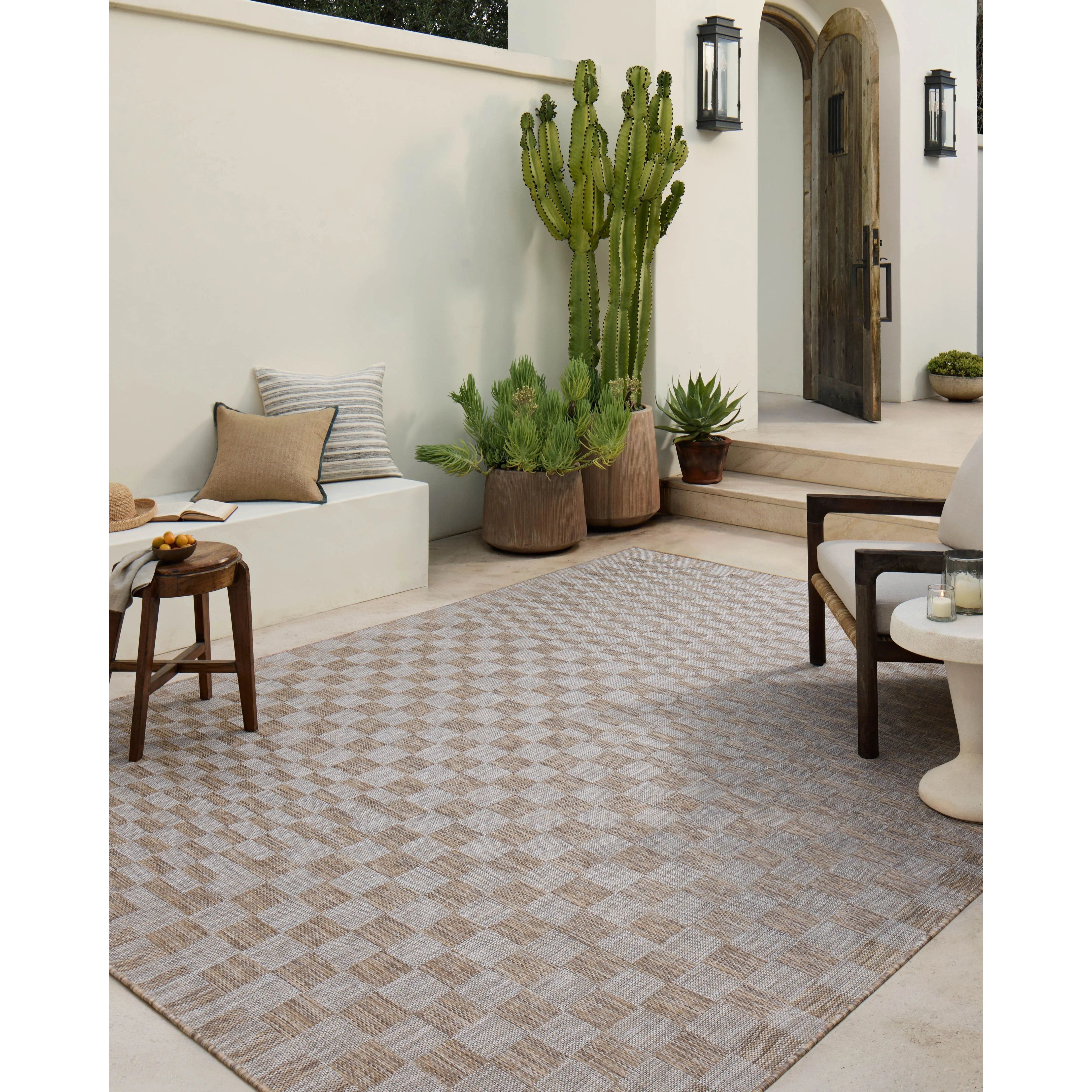 Inspired by the scenic mountain town in California, the Topanga Collection is an indoor/outdoor rug made of durable polypropylene that resembles natural fibers but is much more ready for sun, rain, and high-traffic use. Amethyst Home provides interior design, new home construction design consulting, vintage area rugs, and lighting in the Newport Beach metro area.