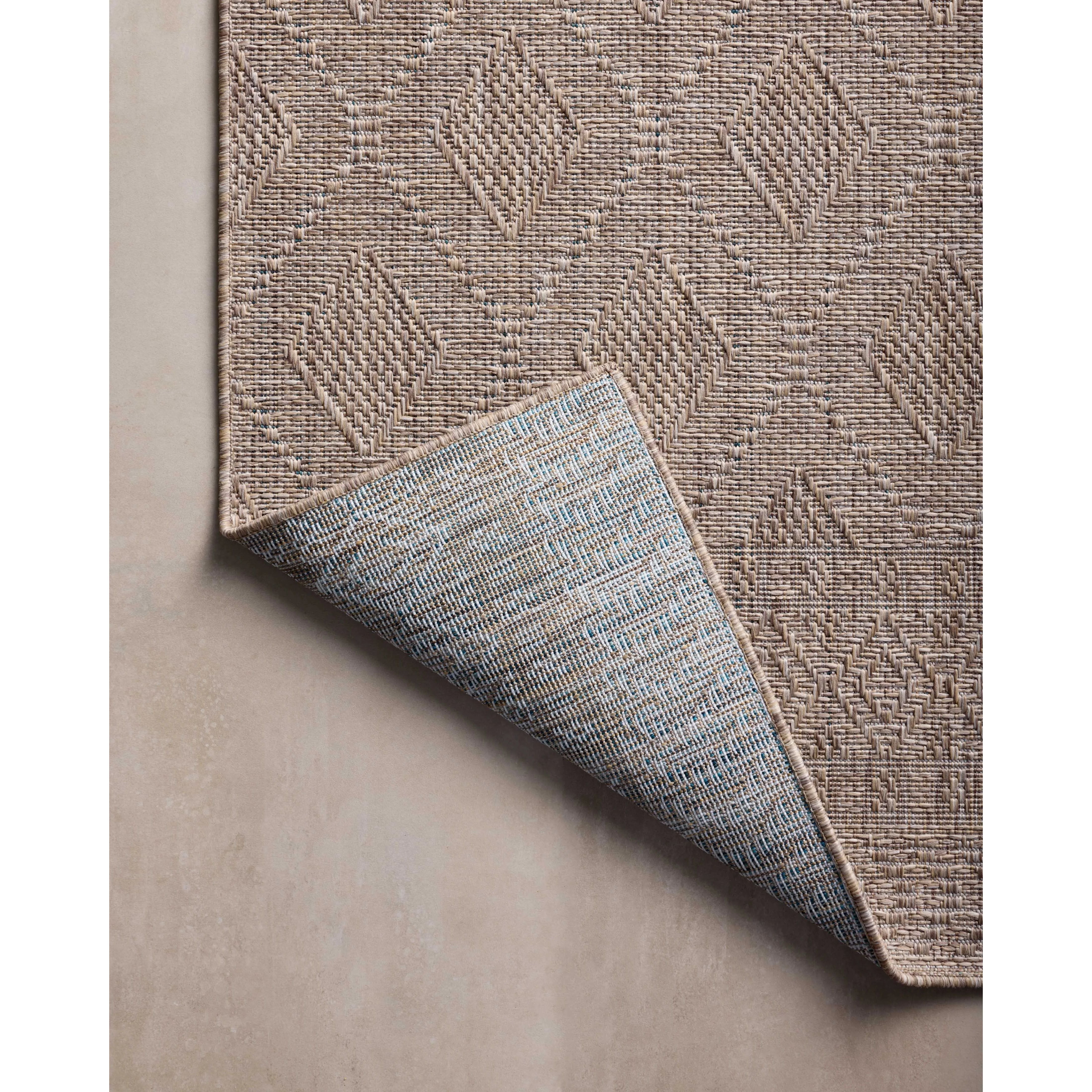 Inspired by the scenic mountain town in California, the Topanga Collection is an indoor/outdoor rug made of durable polypropylene that resembles natural fibers but is much more ready for sun, rain, and high-traffic use. Amethyst Home provides interior design, new home construction design consulting, vintage area rugs, and lighting in the Austin metro area.