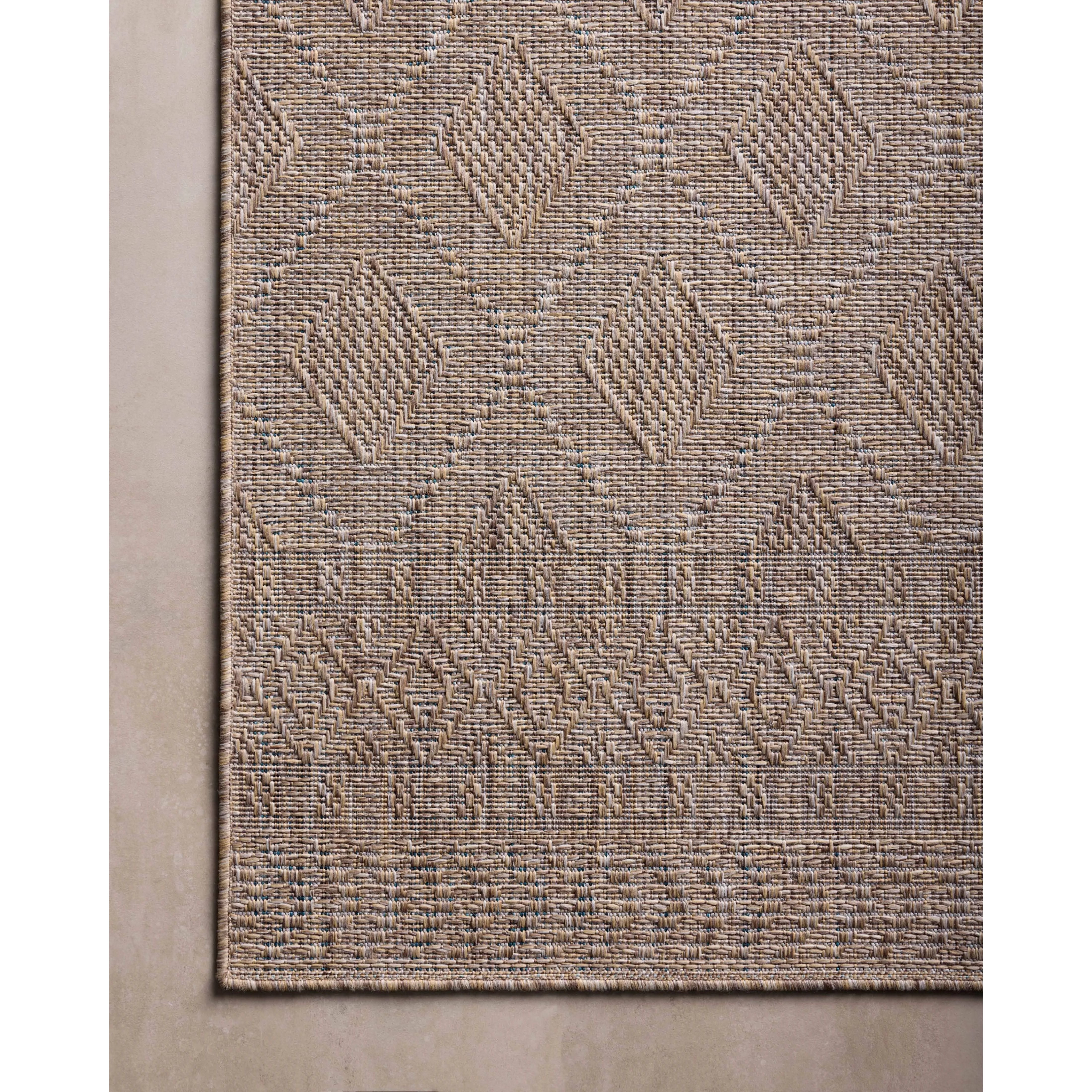 Inspired by the scenic mountain town in California, the Topanga Collection is an indoor/outdoor rug made of durable polypropylene that resembles natural fibers but is much more ready for sun, rain, and high-traffic use. Amethyst Home provides interior design, new home construction design consulting, vintage area rugs, and lighting in the Omaha metro area.
