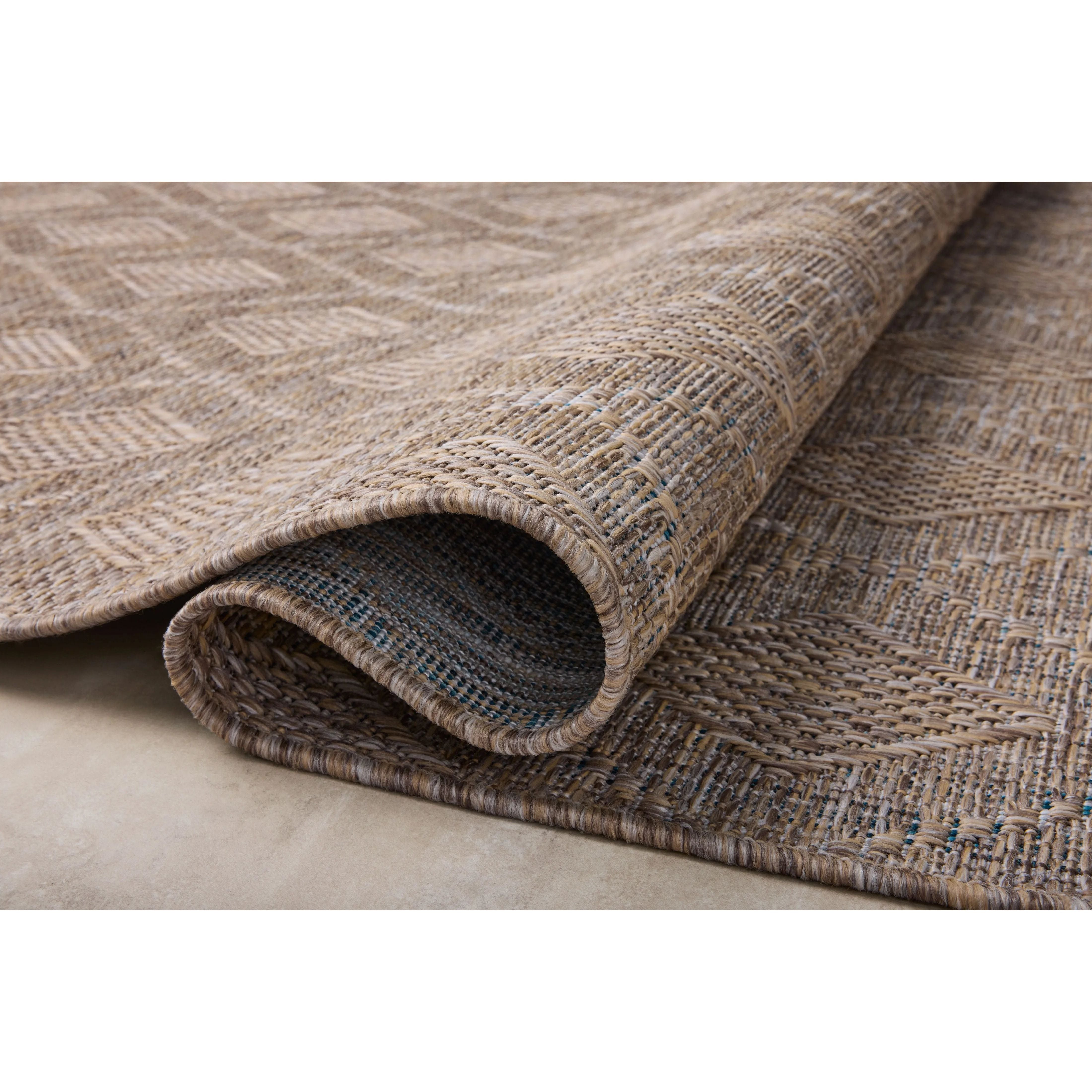 Inspired by the scenic mountain town in California, the Topanga Collection is an indoor/outdoor rug made of durable polypropylene that resembles natural fibers but is much more ready for sun, rain, and high-traffic use. Amethyst Home provides interior design, new home construction design consulting, vintage area rugs, and lighting in the Salt Lake City metro area.
