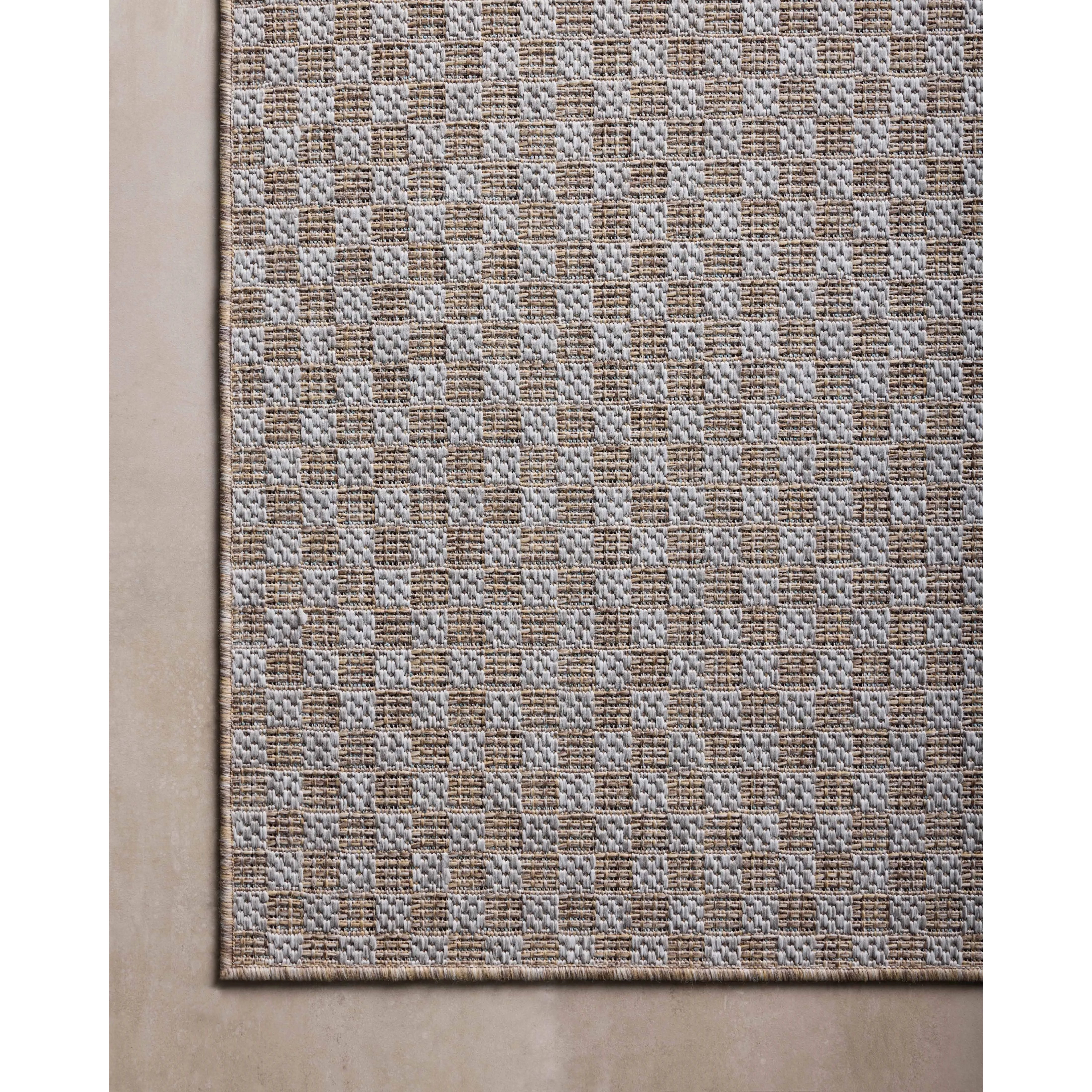Featuring Amber Lewis x Loloi Topanga Natural / Silver Rug by Loloi at Amethyst Home. Inspired by the scenic mountain town in California, the Topanga Collection is an indoor/outdoor rug made of durable polypropylene that resembles natural fibers but is much more ready for sun, rain, and high-traffic use. The rug's modern construction also makes it easy to clea. Amethyst Home provides interior design, new home construction design consulting, vintage area rugs, and lighting in the Dallas metro area.