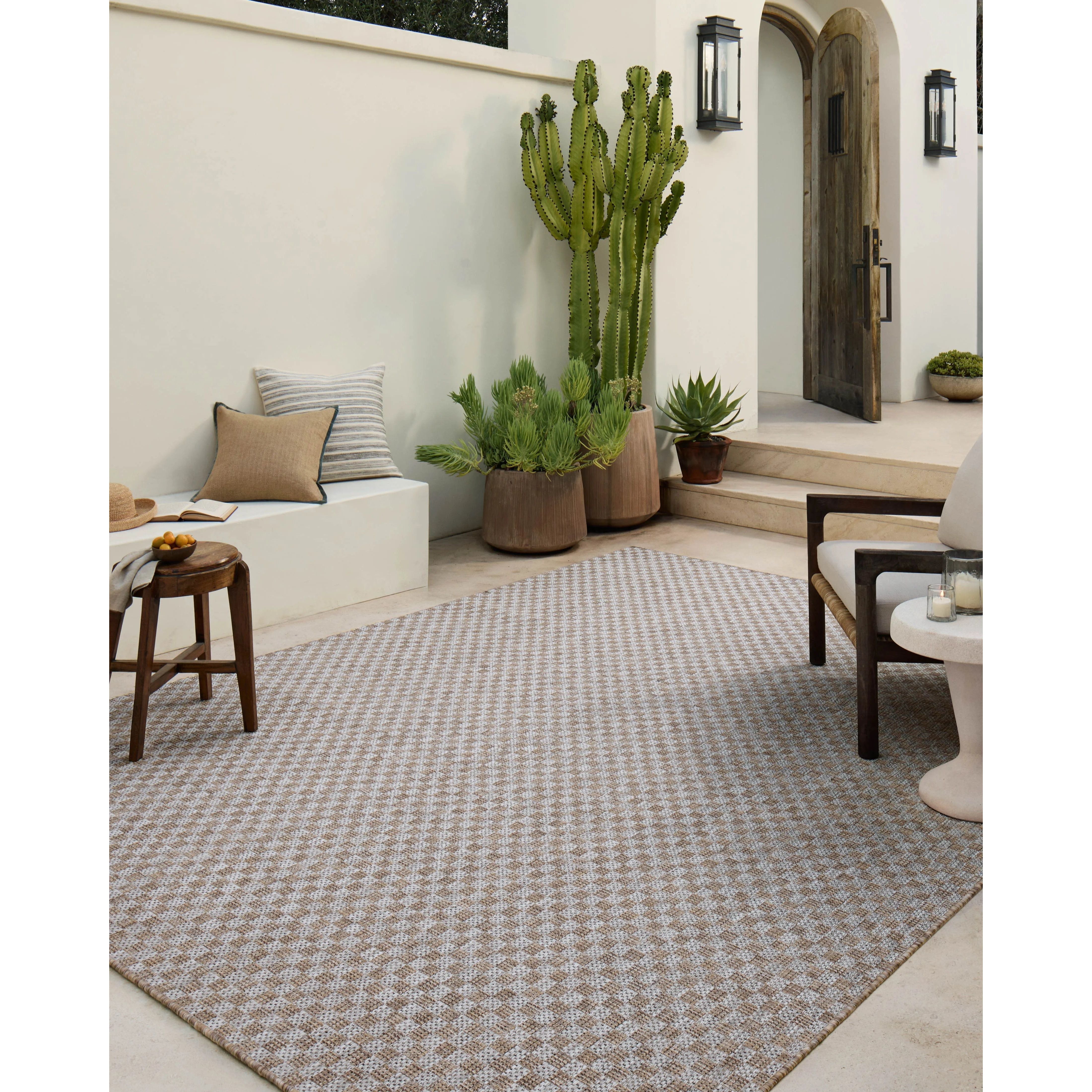 Featuring Amber Lewis x Loloi Topanga Natural / Silver Rug by Loloi at Amethyst Home. Inspired by the scenic mountain town in California, the Topanga Collection is an indoor/outdoor rug made of durable polypropylene that resembles natural fibers but is much more ready for sun, rain, and high-traffic use. The rug's modern construction also makes it easy to . Amethyst Home provides interior design, new home construction design consulting, vintage area rugs, and lighting in the Scottsdale metro area.