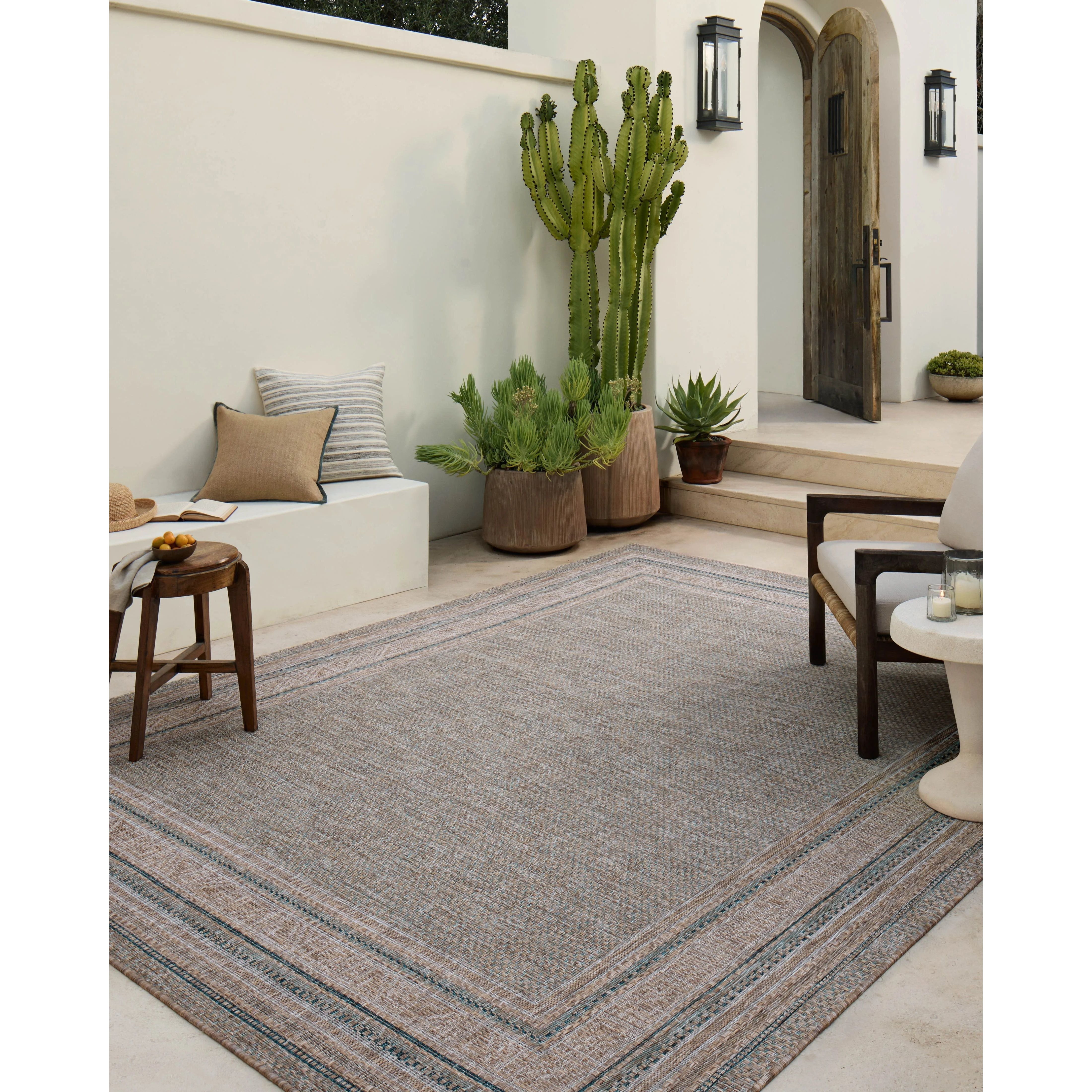 Inspired by the scenic mountain town in California, the Topanga Collection is an indoor/outdoor rug made of durable polypropylene that resembles natural fibers but is much more ready for sun, rain, and high-traffic use. Amethyst Home provides interior design, new home construction design consulting, vintage area rugs, and lighting in the Houston metro area.