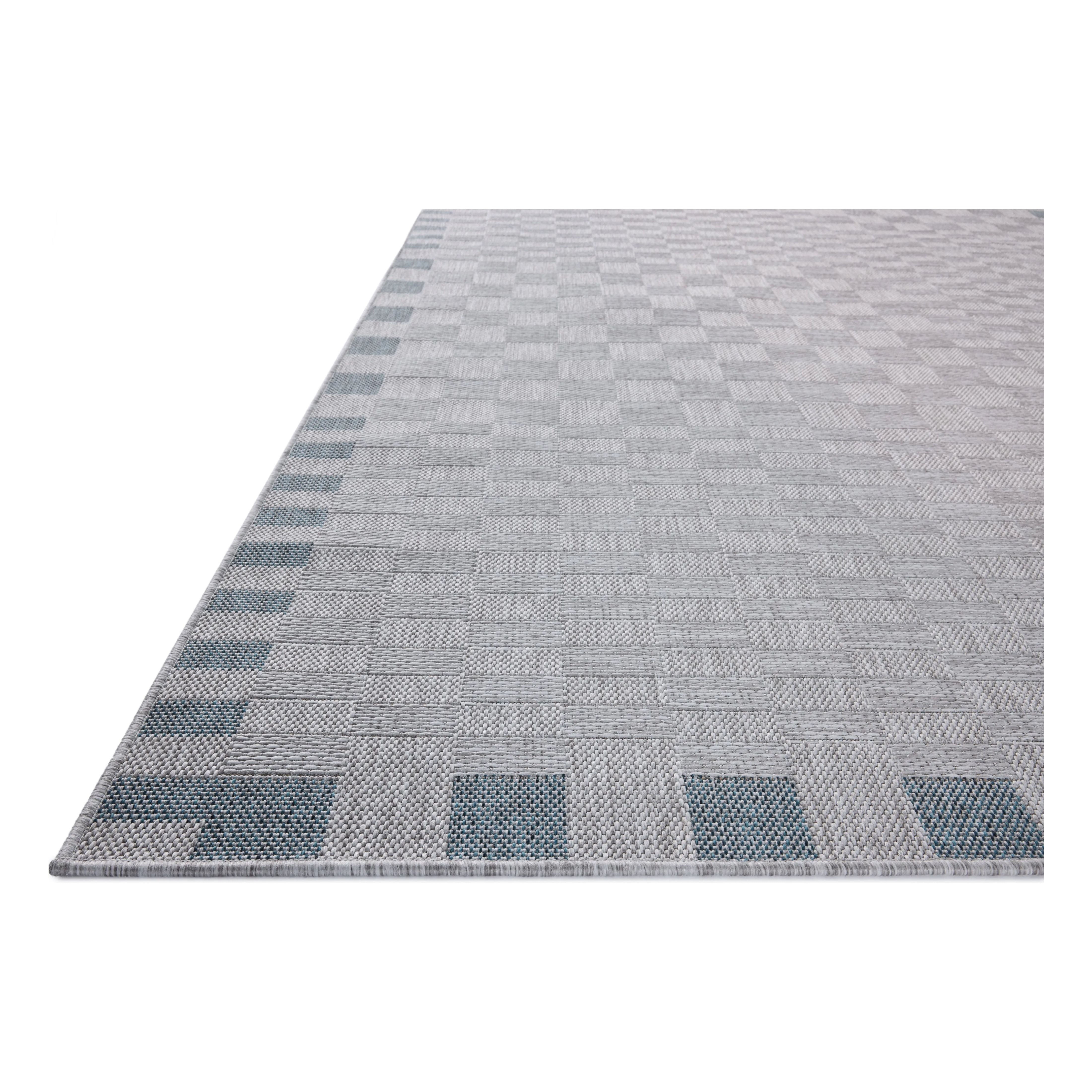 Inspired by the scenic mountain town in California, the Topanga Collection is an indoor/outdoor rug made of durable polypropylene that resembles natural fibers but is much more ready for sun, rain, and high-traffic use. Amethyst Home provides interior design, new home construction design consulting, vintage area rugs, and lighting in the Los Angeles metro area.