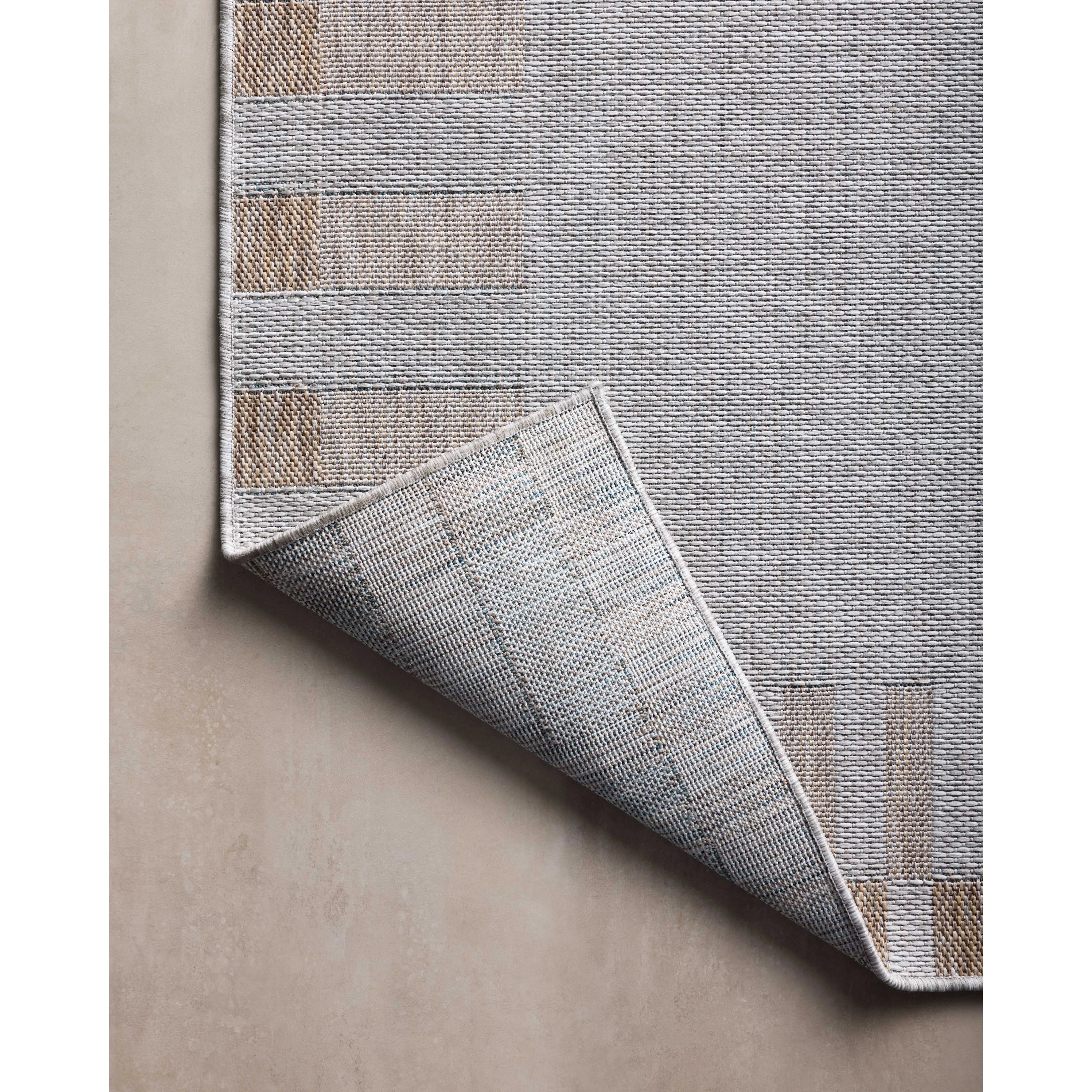 Inspired by the scenic mountain town in California, the Topanga Collection is an indoor/outdoor rug made of durable polypropylene that resembles natural fibers but is much more ready for sun, rain, and high-traffic use. Amethyst Home provides interior design, new home construction design consulting, vintage area rugs, and lighting in the Austin metro area.