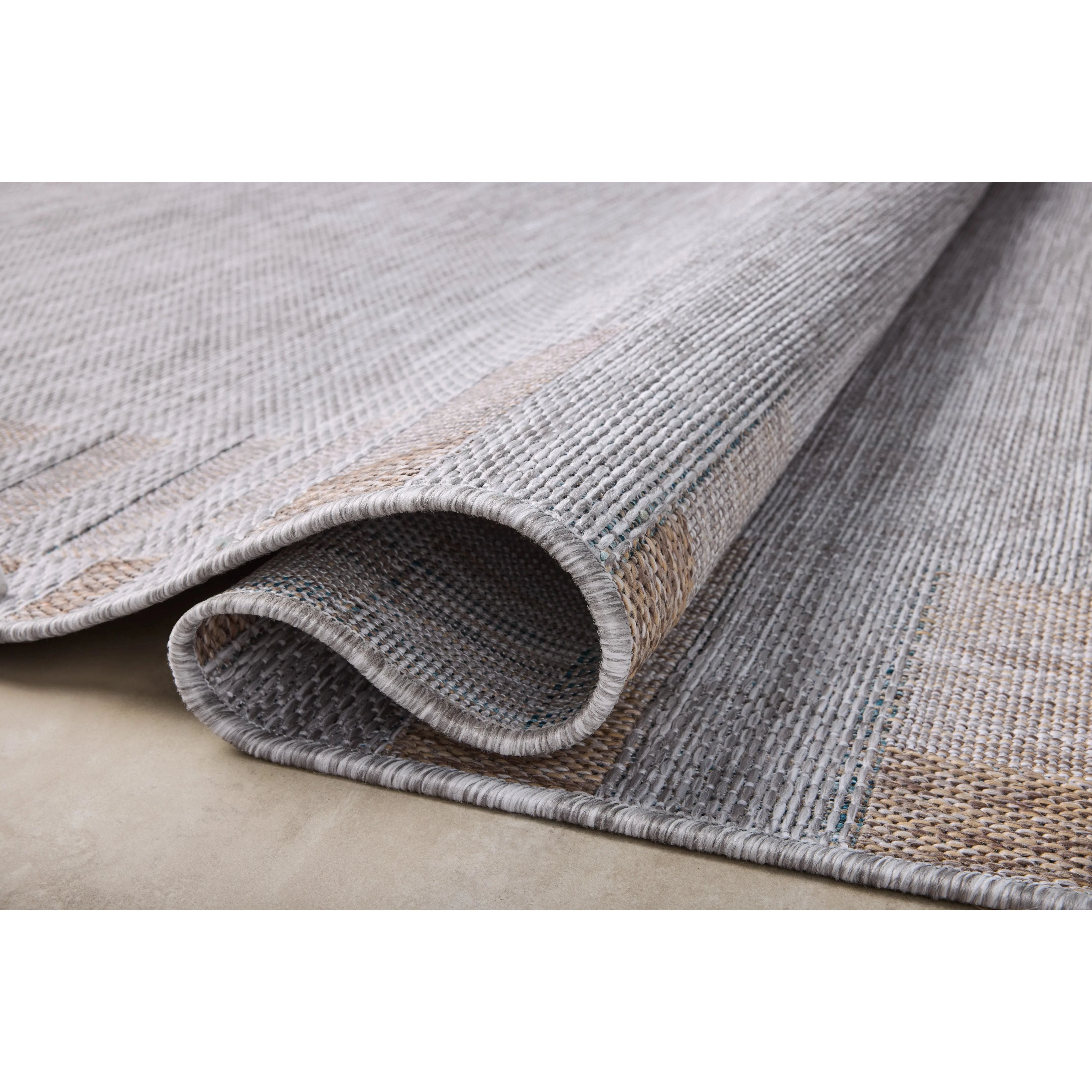 Inspired by the scenic mountain town in California, the Topanga Collection is an indoor/outdoor rug made of durable polypropylene that resembles natural fibers but is much more ready for sun, rain, and high-traffic use. Amethyst Home provides interior design, new home construction design consulting, vintage area rugs, and lighting in the Scottsdale metro area.
