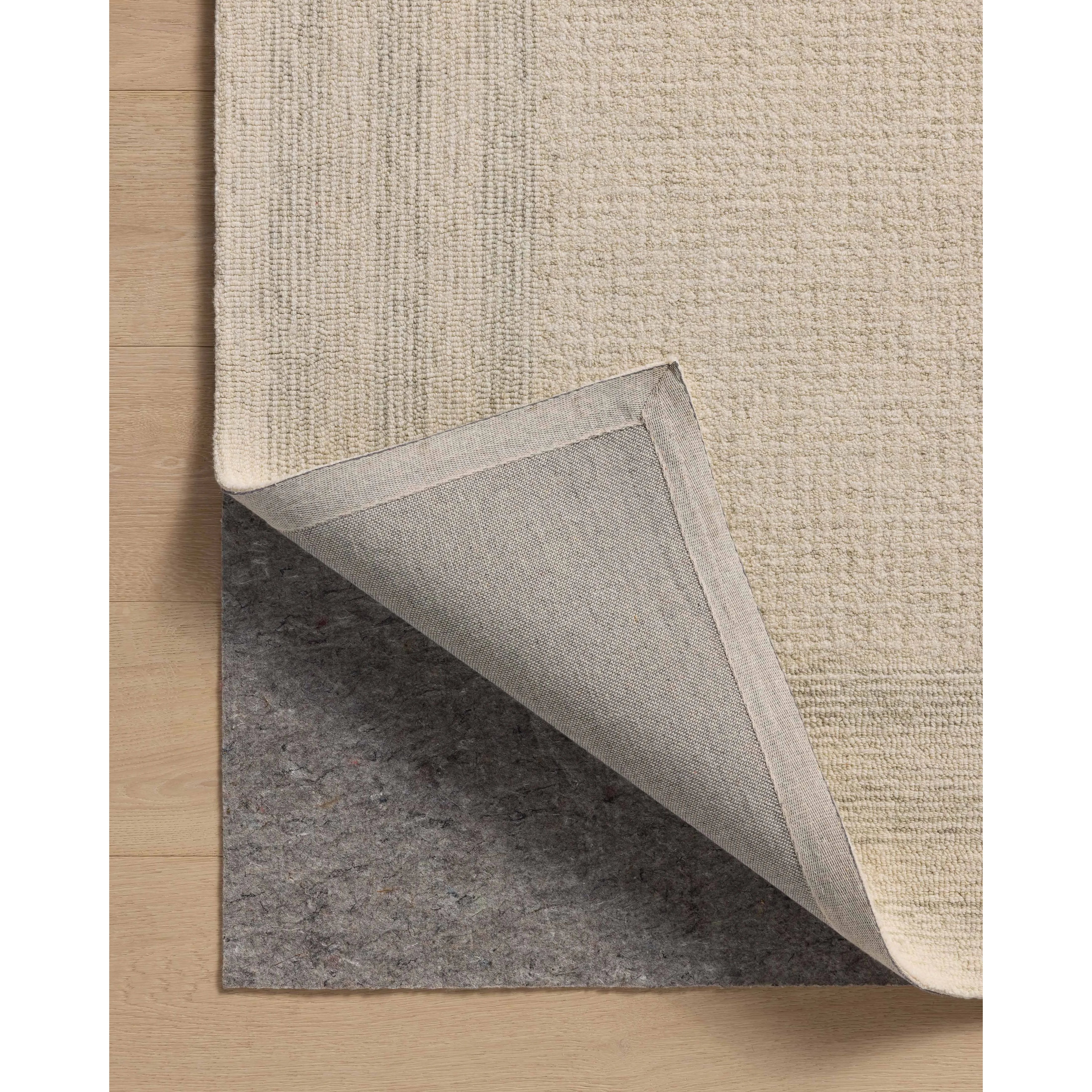 The Windsor Collection reveals the beauty of simplicity. This hand-tufted wool area rug from Amber Lewis x Loloi features a framed design in sophisticated color palettes. The combination of natural materials and tones gives this area rug timeless versatility, with a substantial pile to ground living rooms, bedrooms, and more. Amethyst Home provides interior design, new home construction design consulting, vintage area rugs, and lighting in the Scottsdale metro area.