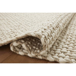 Taking cues from the stunning rock formations and varied landscape of the country’s oldest national park, the Amber Lewis x Loloi Yellowstone Natural / Ivory Rug is made of interwoven wool and jute for a pebbled yet soft, durable rug in natural tones. Amethyst Home provides interior design services, furniture, rugs, and lighting in the Dallas metro area.