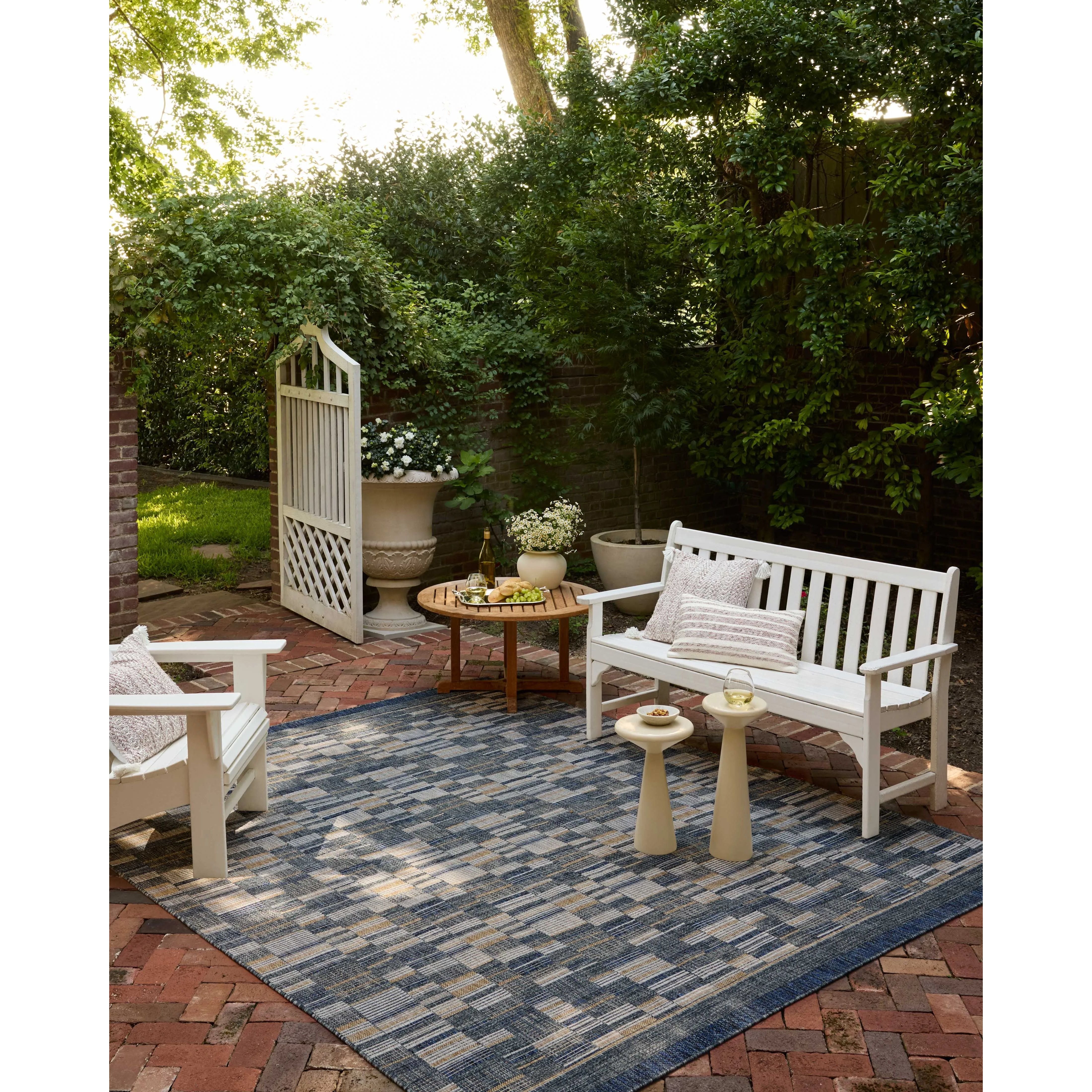 The Birch Collection is a cool-toned area rug with an understated linear design that adds casual structure to contemporary home decor. The rug is power-loomed of durable polyester, an easy-to-clean, no-shed construction for the busiest rooms of the home. Amethyst Home provides interior design, new home construction design consulting, vintage area rugs, and lighting in the Nashville metro area.