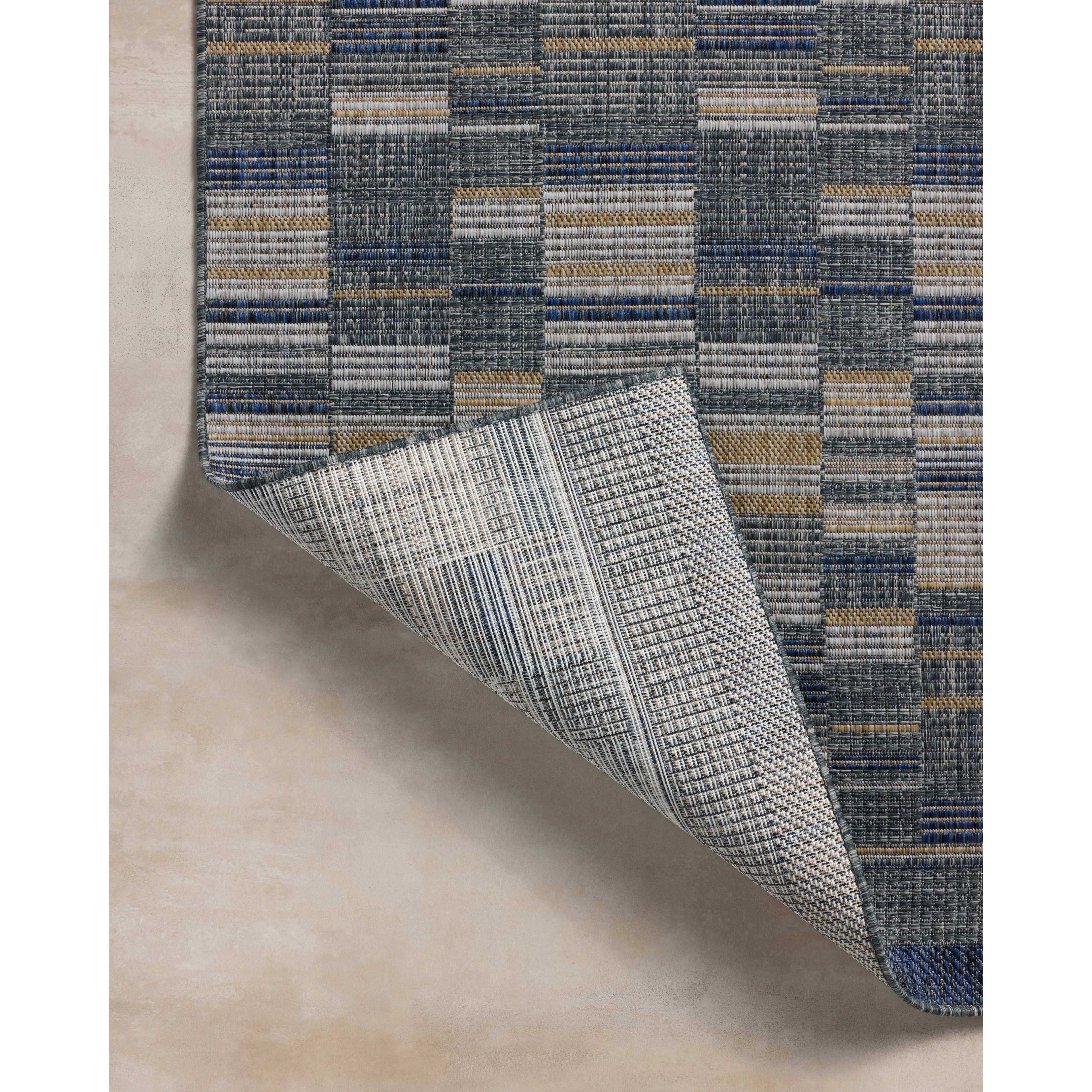 The Birch Collection is a cool-toned area rug with an understated linear design that adds casual structure to contemporary home decor. The rug is power-loomed of durable polyester, an easy-to-clean, no-shed construction for the busiest rooms of the home. Amethyst Home provides interior design, new home construction design consulting, vintage area rugs, and lighting in the Park City metro area.