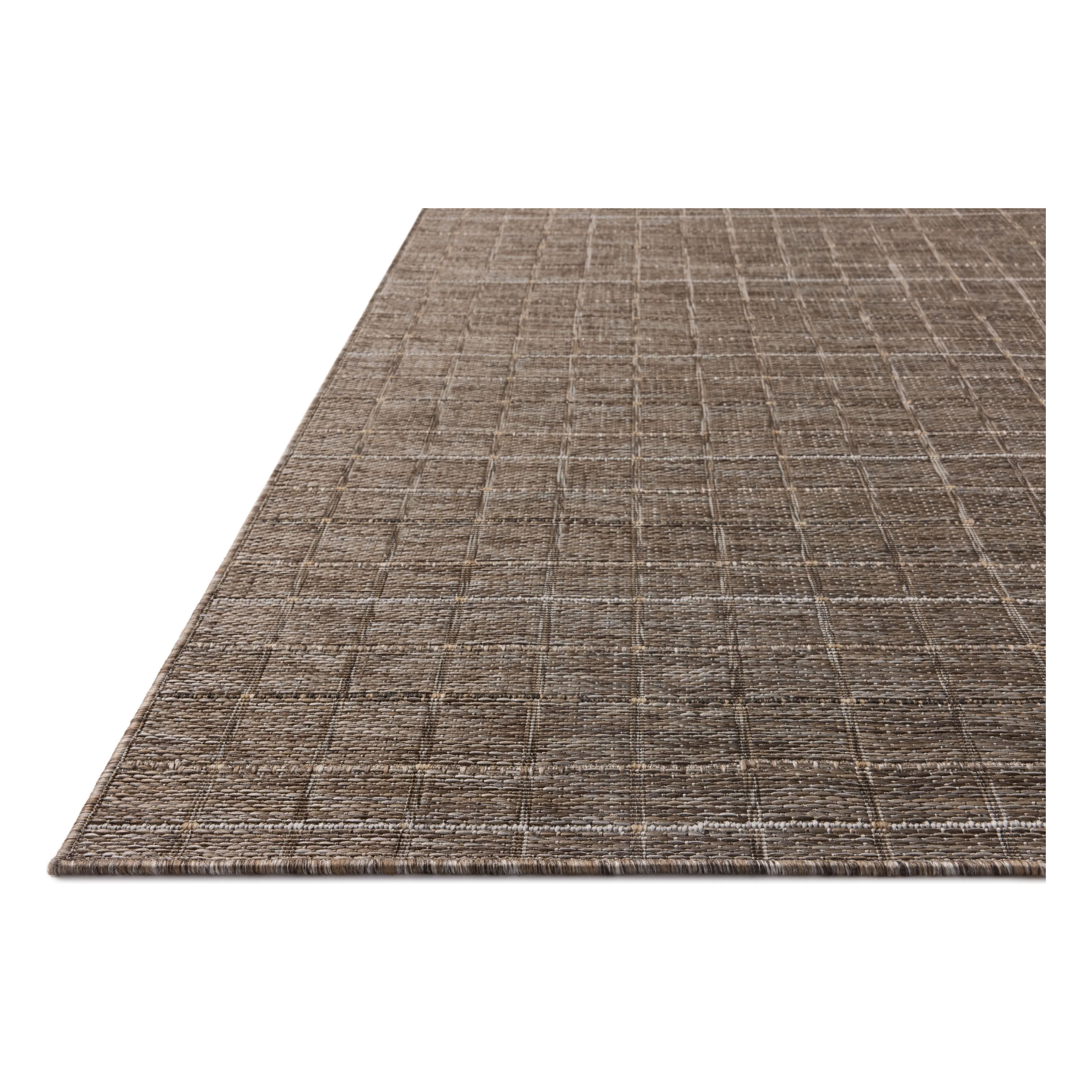 The Birch Collection is a cool-toned area rug with an understated linear design that adds casual structure to contemporary home decor. The rug is power-loomed of durable polyester, an easy-to-clean, no-shed construction for the busiest rooms of the home. Amethyst Home provides interior design, new home construction design consulting, vintage area rugs, and lighting in the Austin metro area.