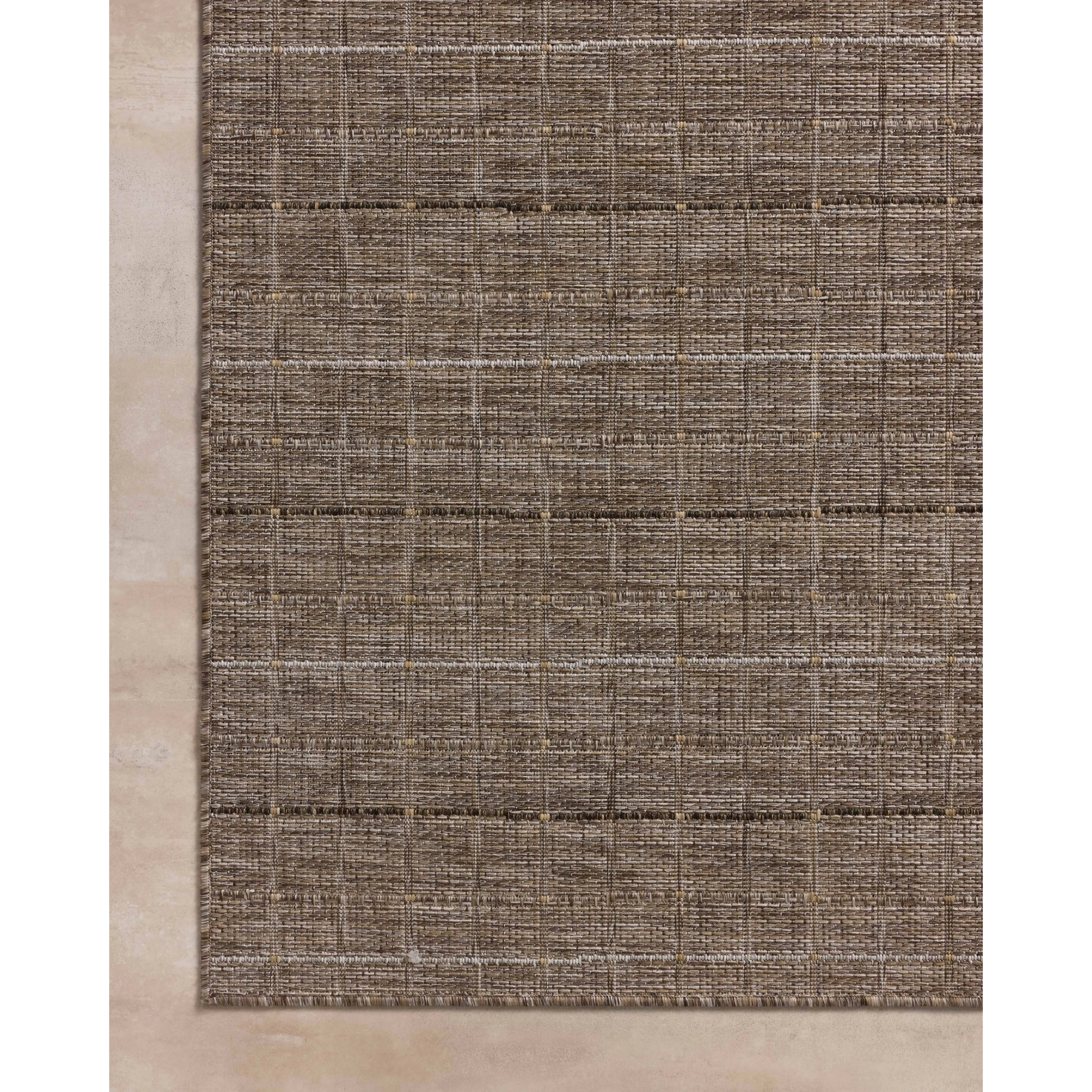 The Birch Collection is a cool-toned area rug with an understated linear design that adds casual structure to contemporary home decor. The rug is power-loomed of durable polyester, an easy-to-clean, no-shed construction for the busiest rooms of the home. Amethyst Home provides interior design, new home construction design consulting, vintage area rugs, and lighting in the Tampa metro area.