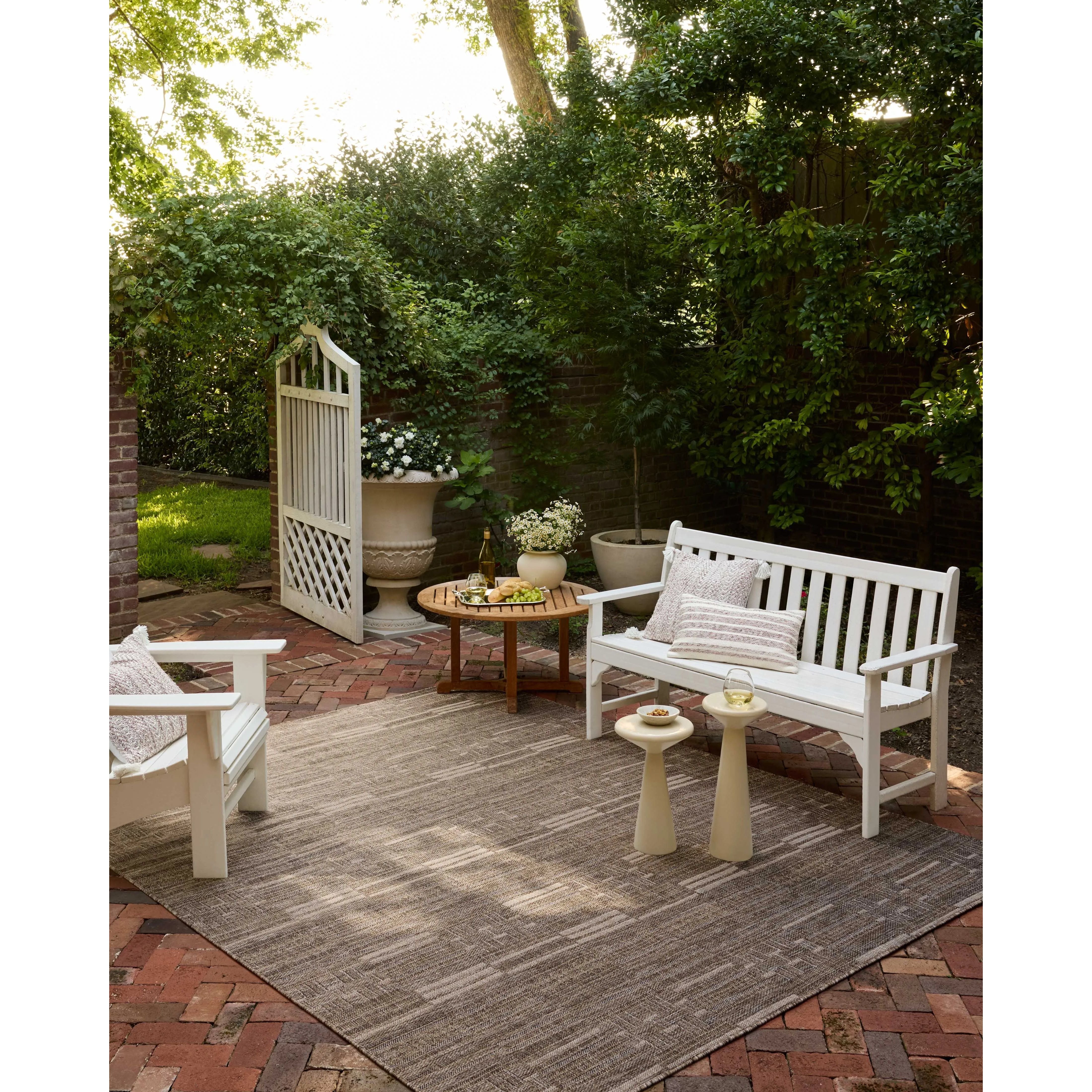 The Birch Collection is a cool-toned area rug with an understated linear design that adds casual structure to contemporary home decor. The rug is power-loomed of durable polyester, an easy-to-clean, no-shed construction for the busiest rooms of the home. Amethyst Home provides interior design, new home construction design consulting, vintage area rugs, and lighting in the Tampa metro area.