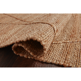 A tonal approach to Moroccan-inspired rugs, the Bodhi Natural / Natural BOD-05 rug from Loloi is hand-woven of 100% jute. This rug features linear and braided details, creating natural variations that make a subtle yet striking statement for an entryway, living room, hallway or kitchen runner, or dining room. Amethyst Home provides interior design, new construction, custom furniture, and rugs for the Austin, Houston, and Dallas, Texas metro area.