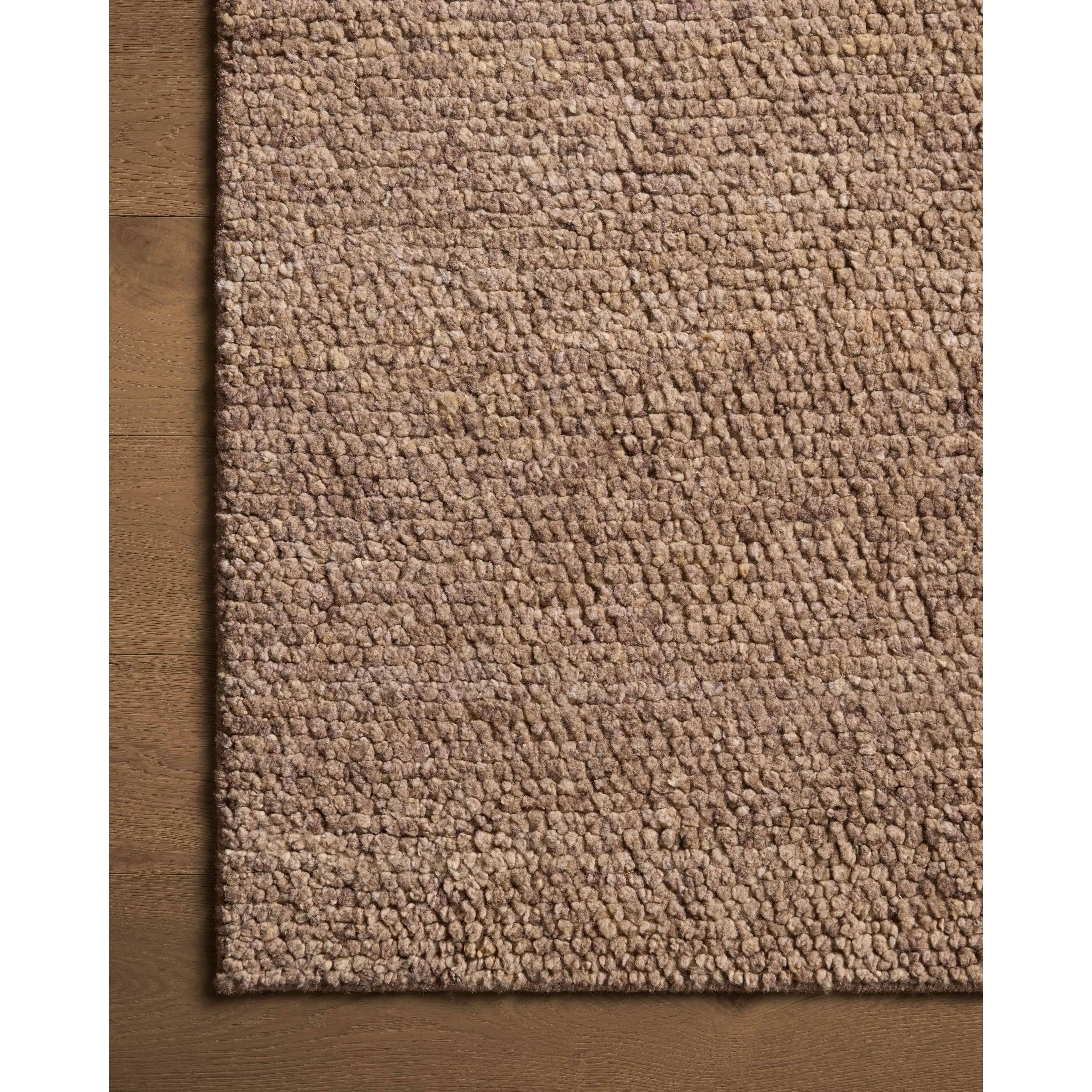 With versatile earth tones and a chunky, hand-knotted texture resembling tiny pebbles, the Frida Dark Taupe Rug by Brigette Romanek x Loloi can ground any room with a sense of elevated ease. Each area rug features a subtle nuance in color variation due to the handmade nature of its construction and has a pleasantly nubby softness underfoot. Amethyst Home provides interior design, new home construction design consulting, vintage area rugs, and lighting in the Des Moines metro area.