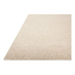 With versatile earth tones and a chunky, hand-knotted texture resembling tiny pebbles, the Frida Natural Rug by Brigette Romanek x Loloi can ground any room with a sense of elevated ease. Each area rug features a subtle nuance in color variation due to the handmade nature of its construction and has a pleasantly nubby softness underfoot. Amethyst Home provides interior design, new home construction design consulting, vintage area rugs, and lighting in the Tampa metro area.