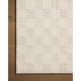 The Knox Ivory / Silver Rug by Brigette Romanek x Loloi is a handwoven area rug with a contemporary checkerboard pattern and a texture reminiscent of a luxurious knit sweater. Made of a blend of wool and cotton that plays with scale and texture, Knox is imbued with cozy luxury that can anchor any room. Amethyst Home provides interior design, new home construction design consulting, vintage area rugs, and lighting in the Omaha metro area.