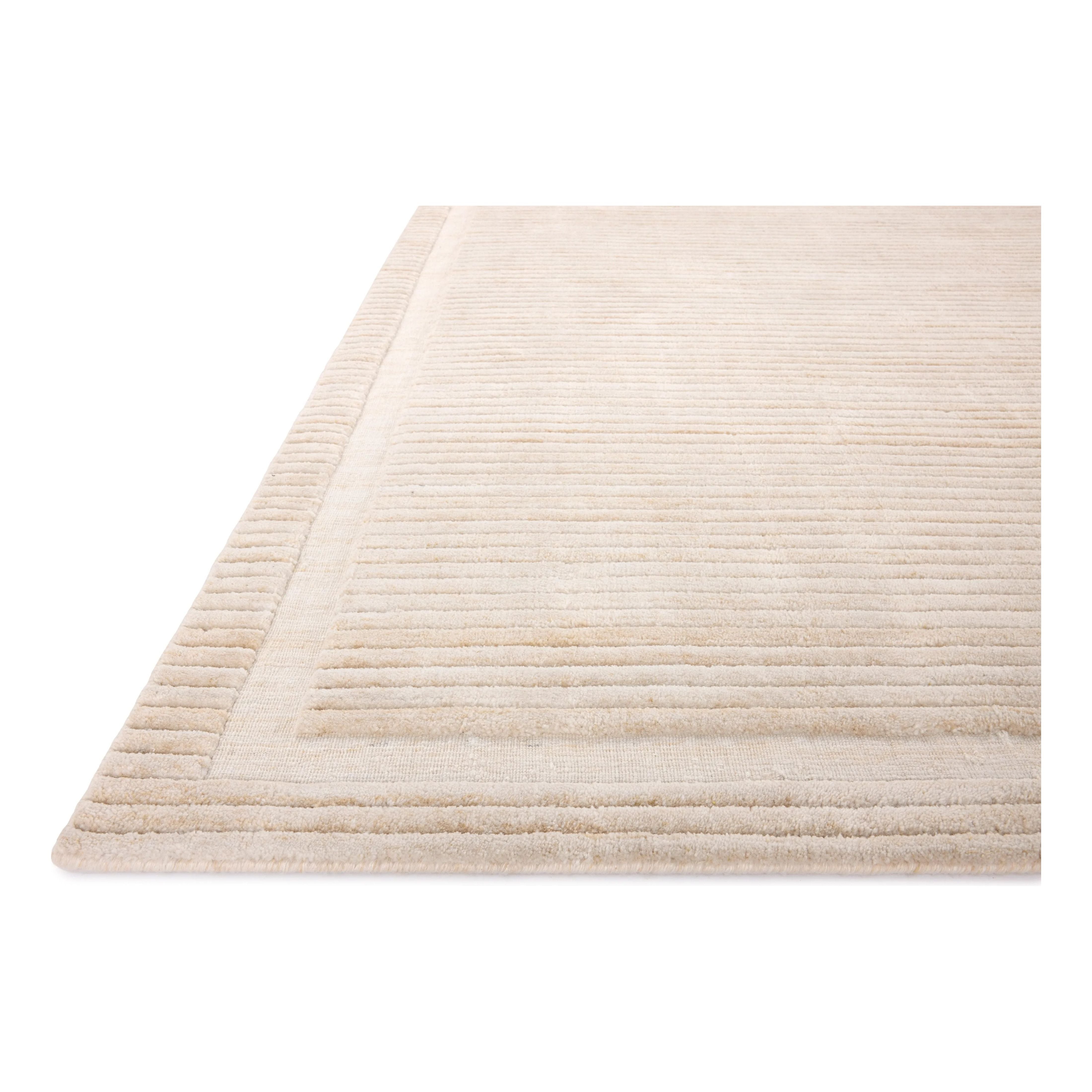 Featuring Brigette Romanek x Loloi Orly Natural Rug by Loloi at Amethyst Home. Irresistible to walk upon, the Dana Natural Rug by Brigette Romanek x Loloi has a high-low texture that alternates between a subtly shaggy pile and a soft base. Horizontal broken stripes give the area rug a fresh and energized structure, while a finish of fringe along the ed. Amethyst Home provides interior design, new home construction design consulting, vintage area rugs, and lighting in the Salt Lake City metro area.