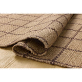 The Fletcher Collection from Chris Loves Julia x Loloi is a power-loomed jute rug with a large-scale grid pattern for an organic modern twist on a classic style. The rugs chunky texture and checkerboard-detailed lines are the refined details that Chris Loves Julia is known for, while the rugs natural palette allows for easy styling in any room. Amethyst Home provides interior design, new home construction design consulting, vintage area rugs, and lighting in the Kansas City metro area.