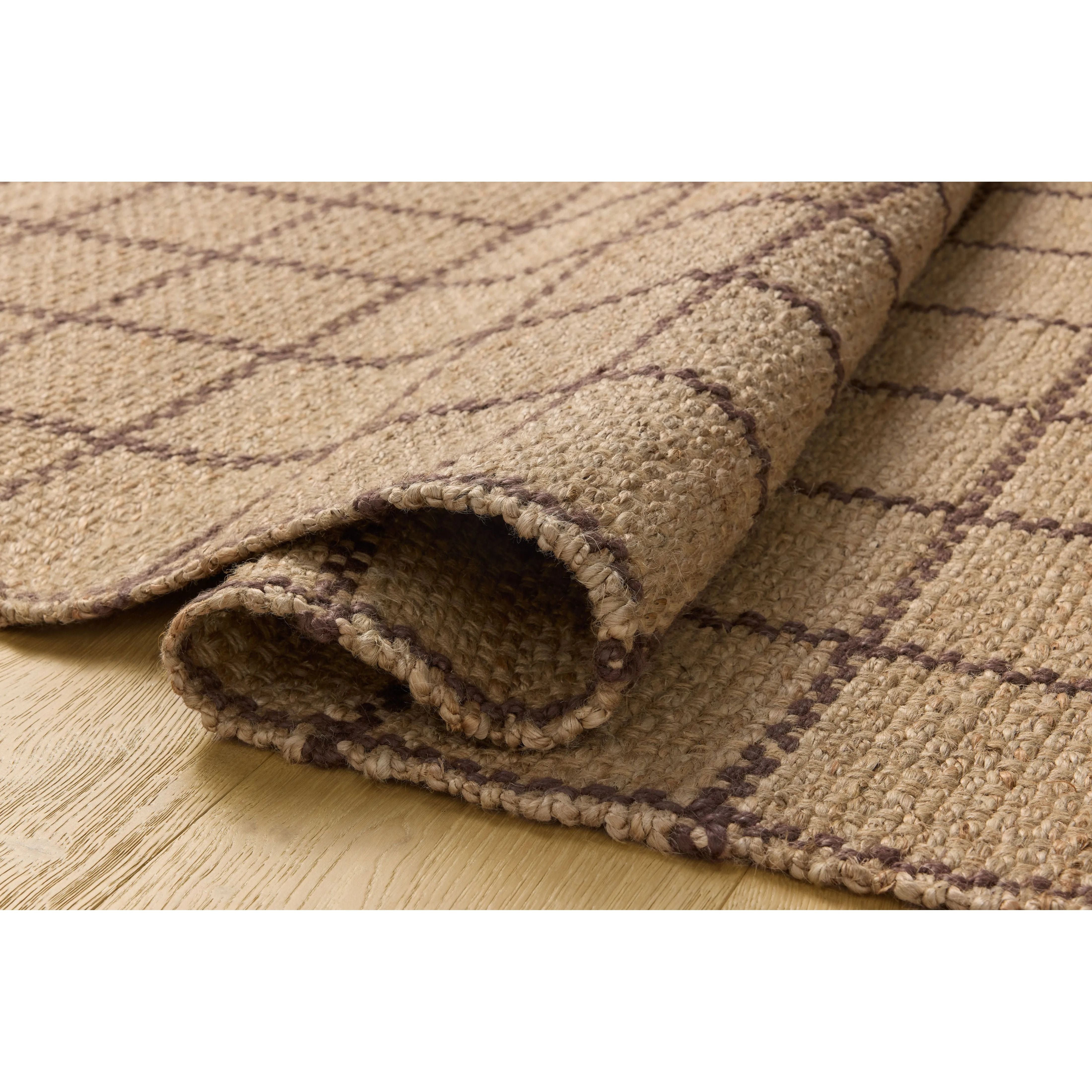 The Fletcher Collection from Chris Loves Julia x Loloi is a power-loomed jute rug with a large-scale grid pattern for an organic modern twist on a classic style. The rugs chunky texture and checkerboard-detailed lines are the refined details that Chris Loves Julia is known for, while the rugs natural palette allows for easy styling in any room. Amethyst Home provides interior design, new home construction design consulting, vintage area rugs, and lighting in the Kansas City metro area.
