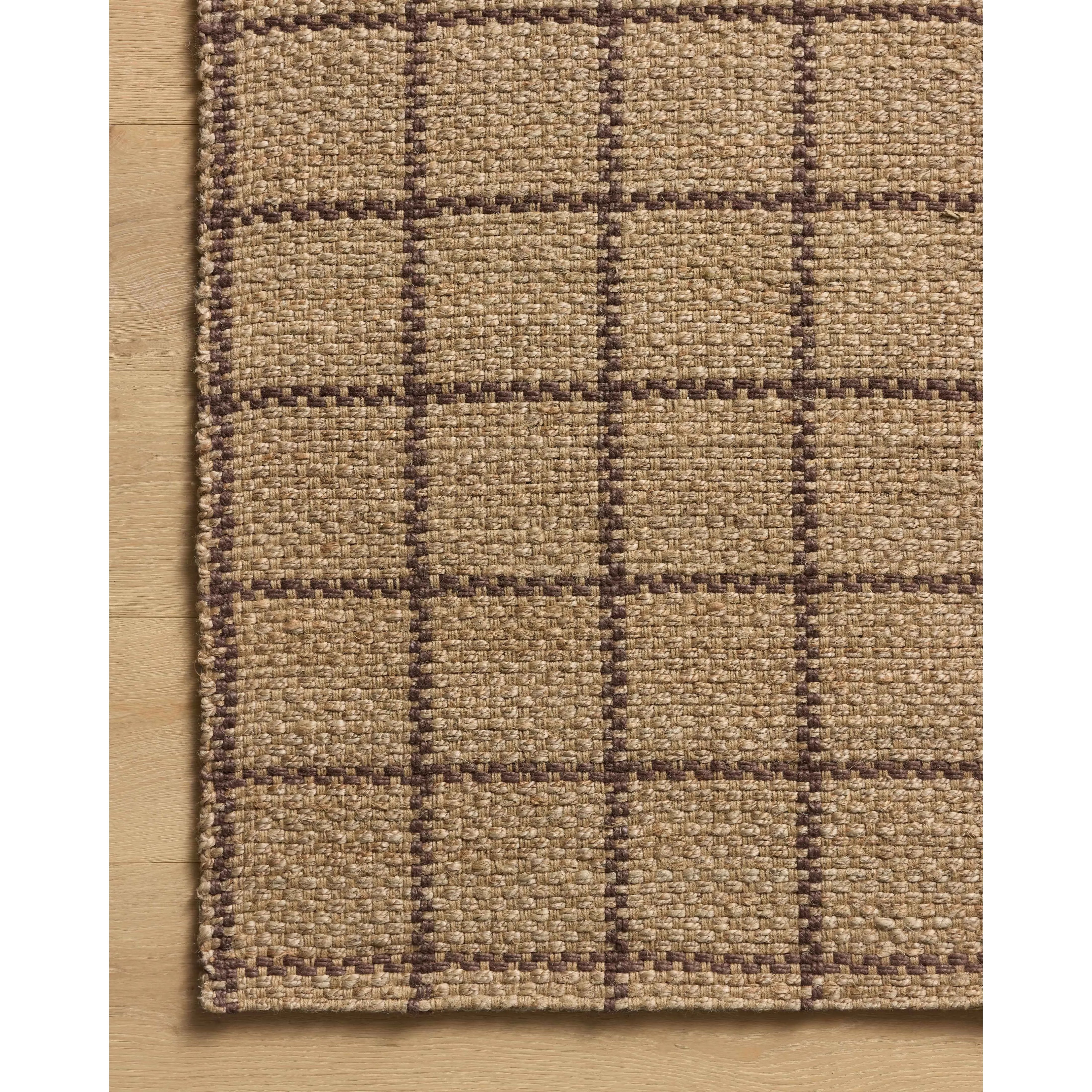 The Fletcher Collection from Chris Loves Julia x Loloi is a power-loomed jute rug with a large-scale grid pattern for an organic modern twist on a classic style. The rugs chunky texture and checkerboard-detailed lines are the refined details that Chris Loves Julia is known for, while the rugs natural palette allows for easy styling in any room. Amethyst Home provides interior design, new home construction design consulting, vintage area rugs, and lighting in the San Diego metro area.