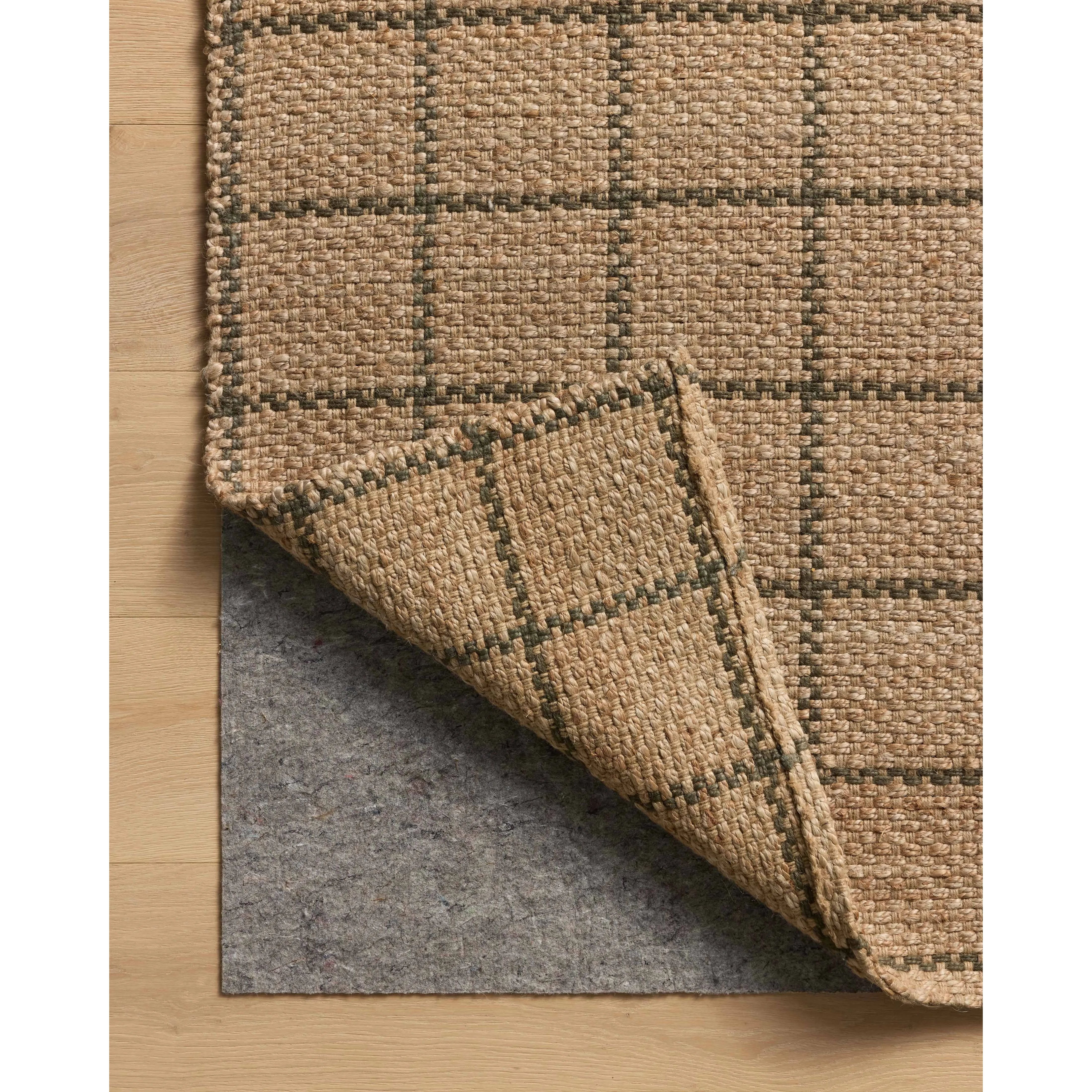 The Fletcher Collection from Chris Loves Julia x Loloi is a power-loomed jute rug with a large-scale grid pattern for an organic modern twist on a classic style. The rugs chunky texture and checkerboard-detailed lines are the refined details that Chris Loves Julia is known for, while the rugs natural palette allows for easy styling in any room. Amethyst Home provides interior design, new home construction design consulting, vintage area rugs, and lighting in the Monterey metro area.