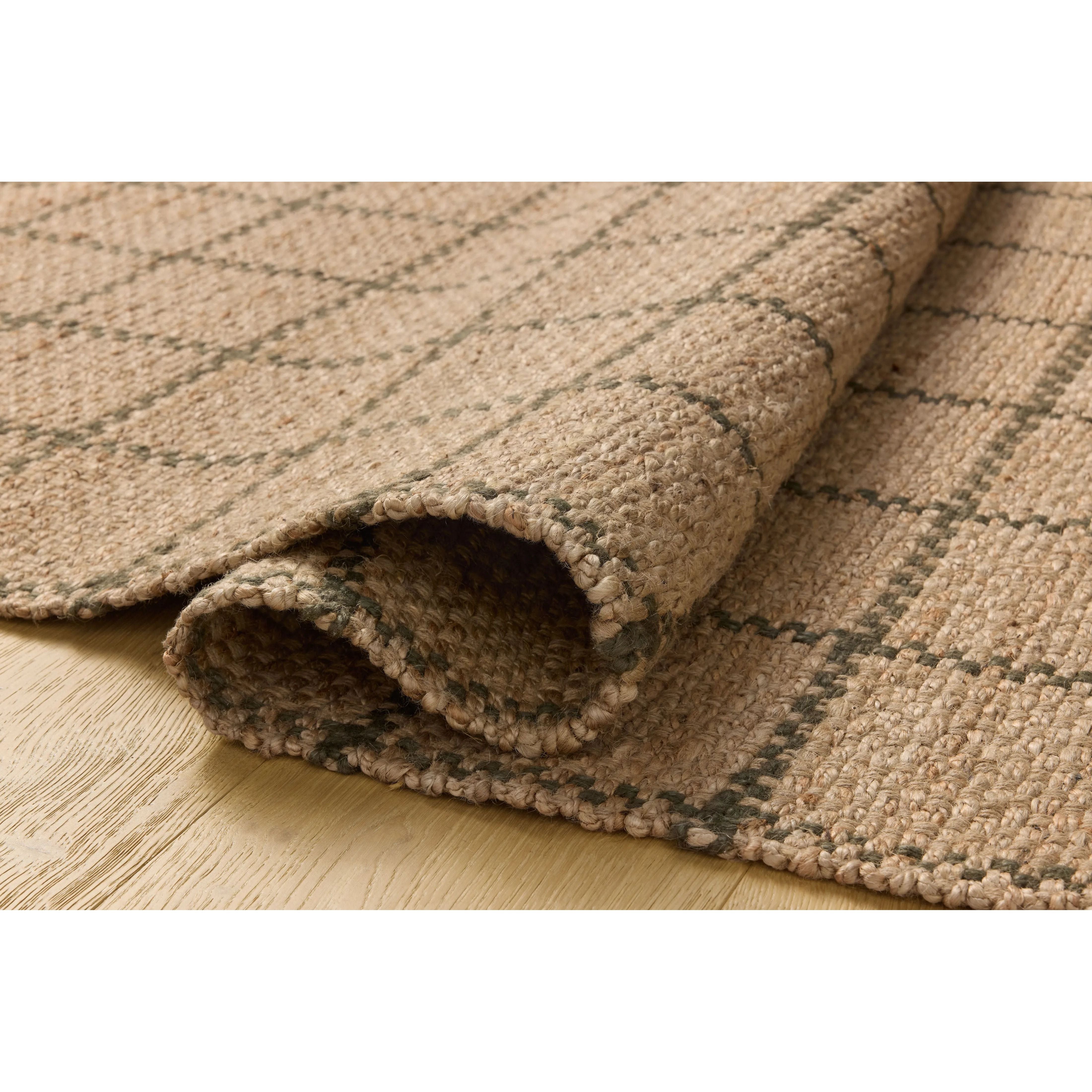 The Fletcher Collection from Chris Loves Julia x Loloi is a power-loomed jute rug with a large-scale grid pattern for an organic modern twist on a classic style. The rugs chunky texture and checkerboard-detailed lines are the refined details that Chris Loves Julia is known for, while the rugs natural palette allows for easy styling in any room. Amethyst Home provides interior design, new home construction design consulting, vintage area rugs, and lighting in the Tampa metro area.