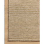 The Henry Collection from Chris Loves Julia x Loloi is a hand-tufted area rug that adds a touch of personality to a solid-colored design that can easily pair with other patterns in the room. These designs feature tufted stripes for subtle contrast and depth. The rugs wool pile is thick and satisfying to walk on, with gently nuanced color variation. Amethyst Home provides interior design, new home construction design consulting, vintage area rugs, and lighting in the Nashville metro area.