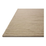 The Henry Collection from Chris Loves Julia x Loloi is a hand-tufted area rug that adds a touch of personality to a solid-colored design that can easily pair with other patterns in the room. These designs feature tufted stripes for subtle contrast and depth. The rugs wool pile is thick and satisfying to walk on, with gently nuanced color variation. Amethyst Home provides interior design, new home construction design consulting, vintage area rugs, and lighting in the Newport Beach metro area.