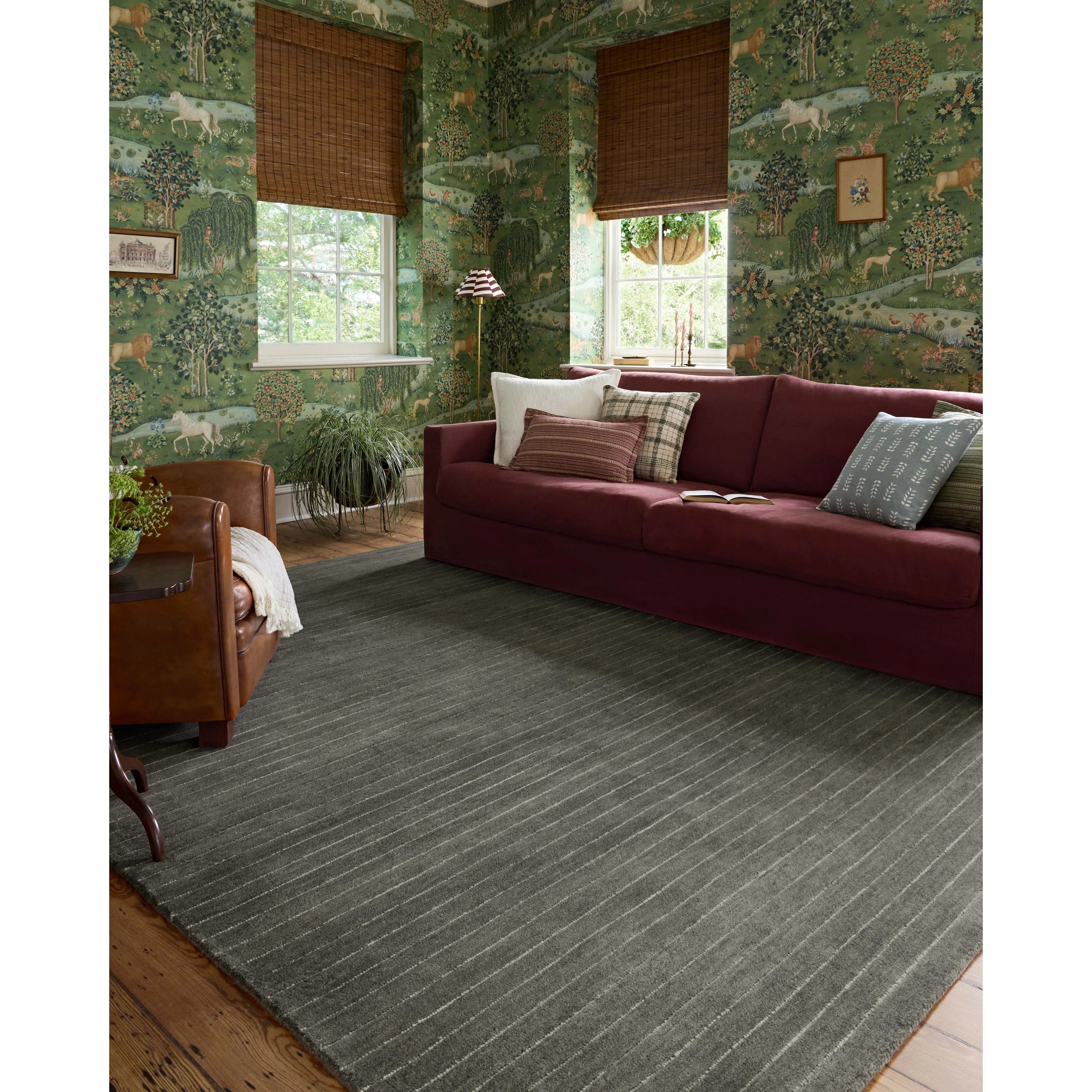 The Henry Collection from Chris Loves Julia x Loloi is a hand-tufted area rug that adds a touch of personality to a solid-colored design that can easily pair with other patterns in the room. These designs feature tufted stripes for subtle contrast and depth. The rugs wool pile is thick and satisfying to walk on, with gently nuanced color variation. Amethyst Home provides interior design, new home construction design consulting, vintage area rugs, and lighting in the Kansas City metro area.