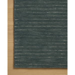 The Henry Collection from Chris Loves Julia x Loloi is a hand-tufted area rug that adds a touch of personality to a solid-colored design that can easily pair with other patterns in the room. These designs feature tufted stripes for subtle contrast and depth. The rugs wool pile is thick and satisfying to walk on, with gently nuanced color variation. Amethyst Home provides interior design, new home construction design consulting, vintage area rugs, and lighting in the Nashville metro area.