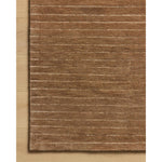 The Henry Collection from Chris Loves Julia x Loloi is a hand-tufted area rug that adds a touch of personality to a solid-colored design that can easily pair with other patterns in the room. These designs feature tufted stripes for subtle contrast and depth. The rugs wool pile is thick and satisfying to walk on, with gently nuanced color variation. Amethyst Home provides interior design, new home construction design consulting, vintage area rugs, and lighting in the Scottsdale metro area.