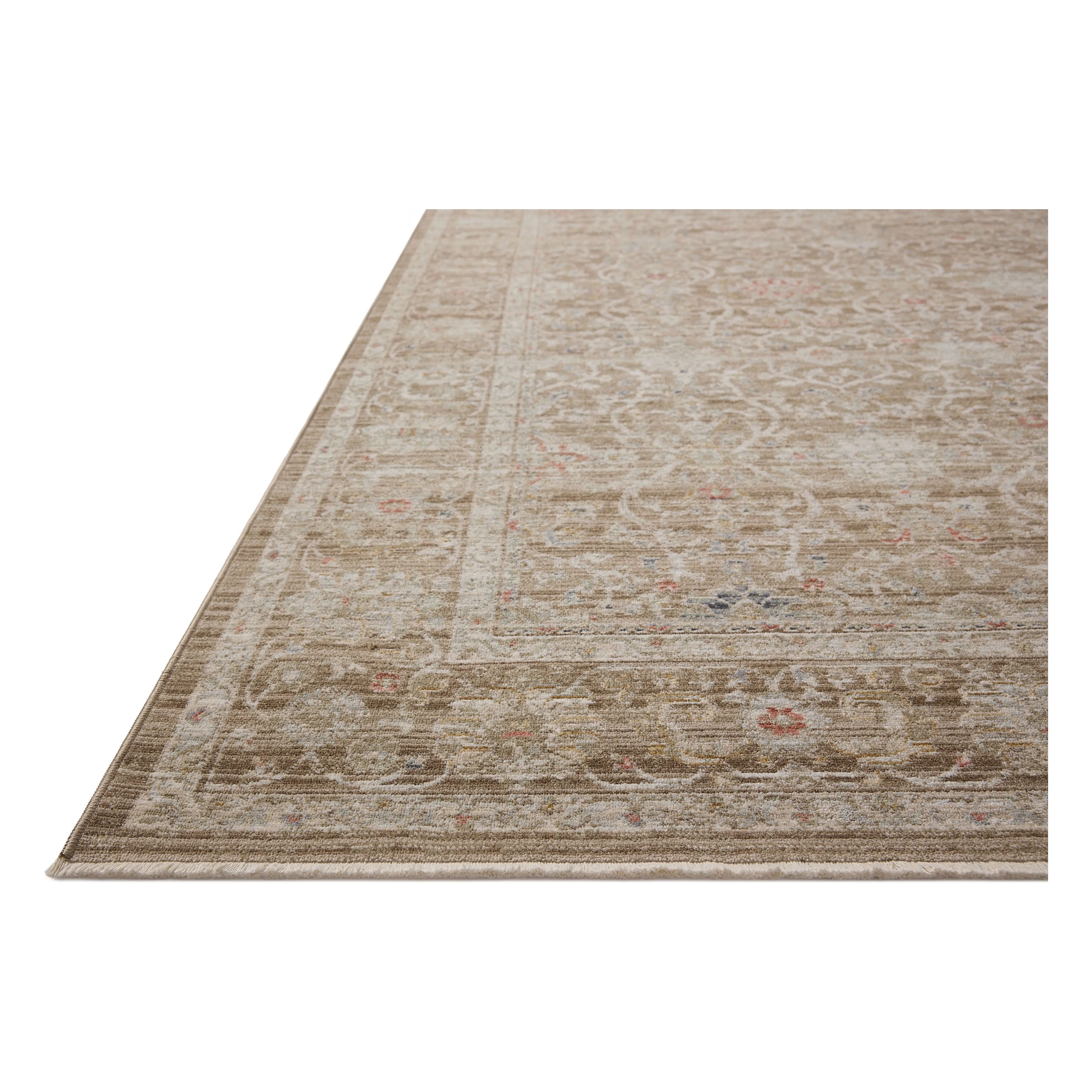 The Ida Collection from Chris Loves Julia x Loloi is a vintage-inspired area rug with a soft, subtly textured pile similar to hand-knotted rugs. The rugs gentle distressing creates a timeless look, while its durability and earthy colorways make it a great choice for the busiest rooms of the home, especially living rooms, kitchens, and hallways. Amethyst Home provides interior design, new home construction design consulting, vintage area rugs, and lighting in the Salt Lake City metro area.