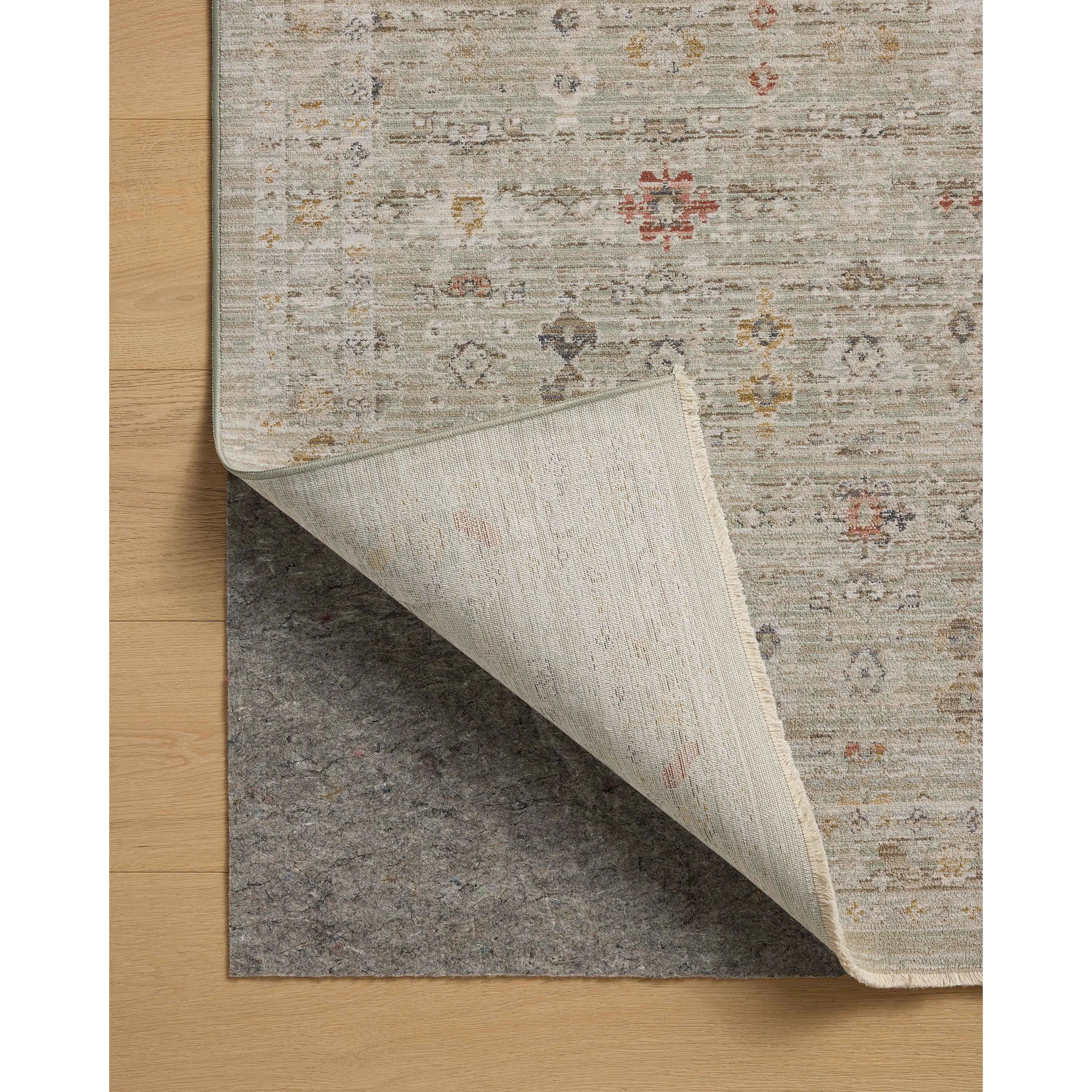 The Ida Collection from Chris Loves Julia x Loloi is a vintage-inspired area rug with a soft, subtly textured pile similar to hand-knotted rugs. The rugs gentle distressing creates a timeless look, while its durability and earthy colorways make it a great choice for the busiest rooms of the home, especially living rooms, kitchens, and hallways. Amethyst Home provides interior design, new home construction design consulting, vintage area rugs, and lighting in the Los Angeles metro area.