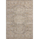 The Ida Collection from Chris Loves Julia x Loloi is a vintage-inspired area rug with a soft, subtly textured pile similar to hand-knotted rugs. The rugs gentle distressing creates a timeless look, while its durability and earthy colorways make it a great choice for the busiest rooms of the home, especially living rooms, kitchens, and hallways. Amethyst Home provides interior design, new home construction design consulting, vintage area rugs, and lighting in the Dallas metro area.
