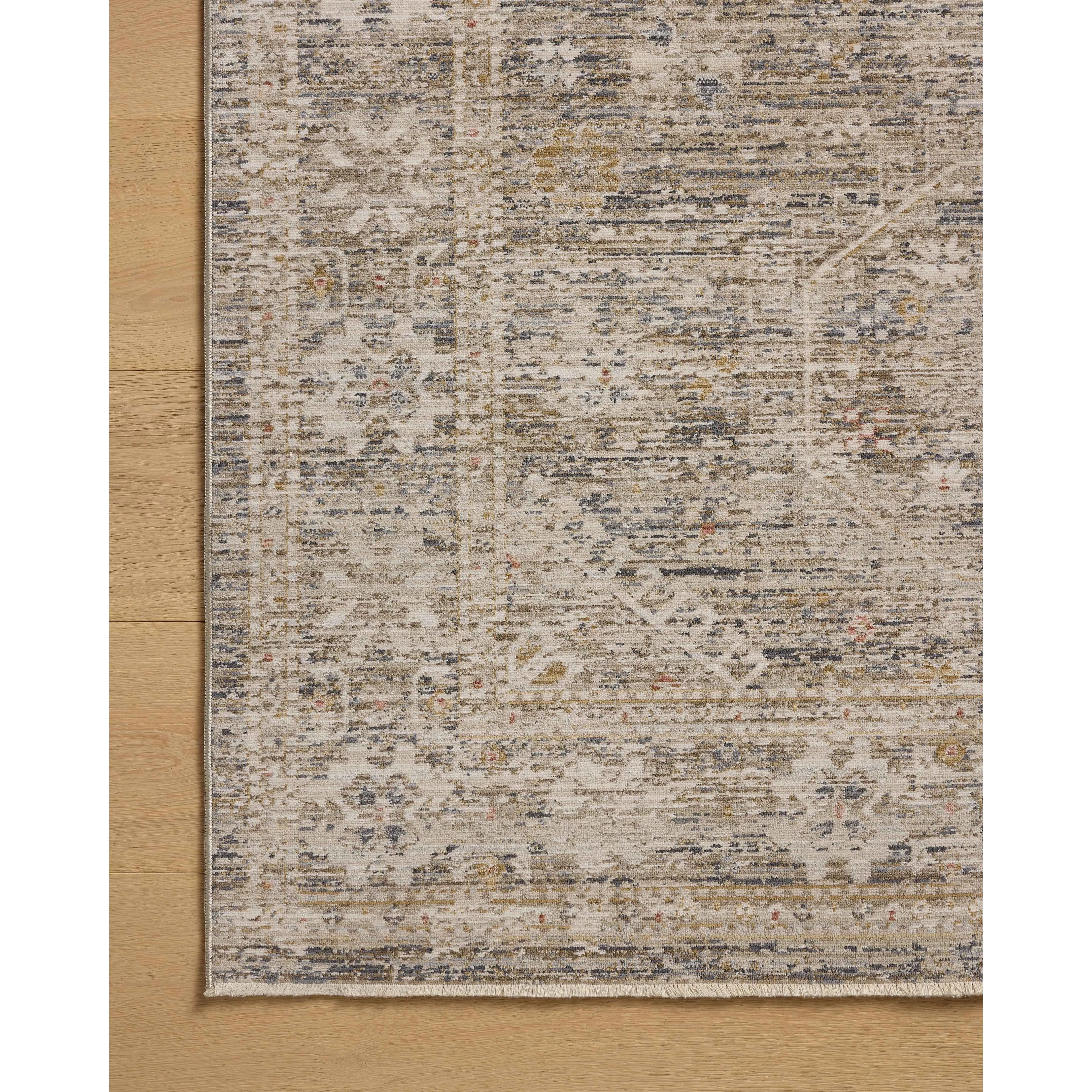 The Ida Collection from Chris Loves Julia x Loloi is a vintage-inspired area rug with a soft, subtly textured pile similar to hand-knotted rugs. The rugs gentle distressing creates a timeless look, while its durability and earthy colorways make it a great choice for the busiest rooms of the home, especially living rooms, kitchens, and hallways. Amethyst Home provides interior design, new home construction design consulting, vintage area rugs, and lighting in the Scottsdale metro area.