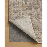 The Ida Collection from Chris Loves Julia x Loloi is a vintage-inspired area rug with a soft, subtly textured pile similar to hand-knotted rugs. The rugs gentle distressing creates a timeless look, while its durability and earthy colorways make it a great choice for the busiest rooms of the home, especially living rooms, kitchens, and hallways. Amethyst Home provides interior design, new home construction design consulting, vintage area rugs, and lighting in the Winter Garden metro area.