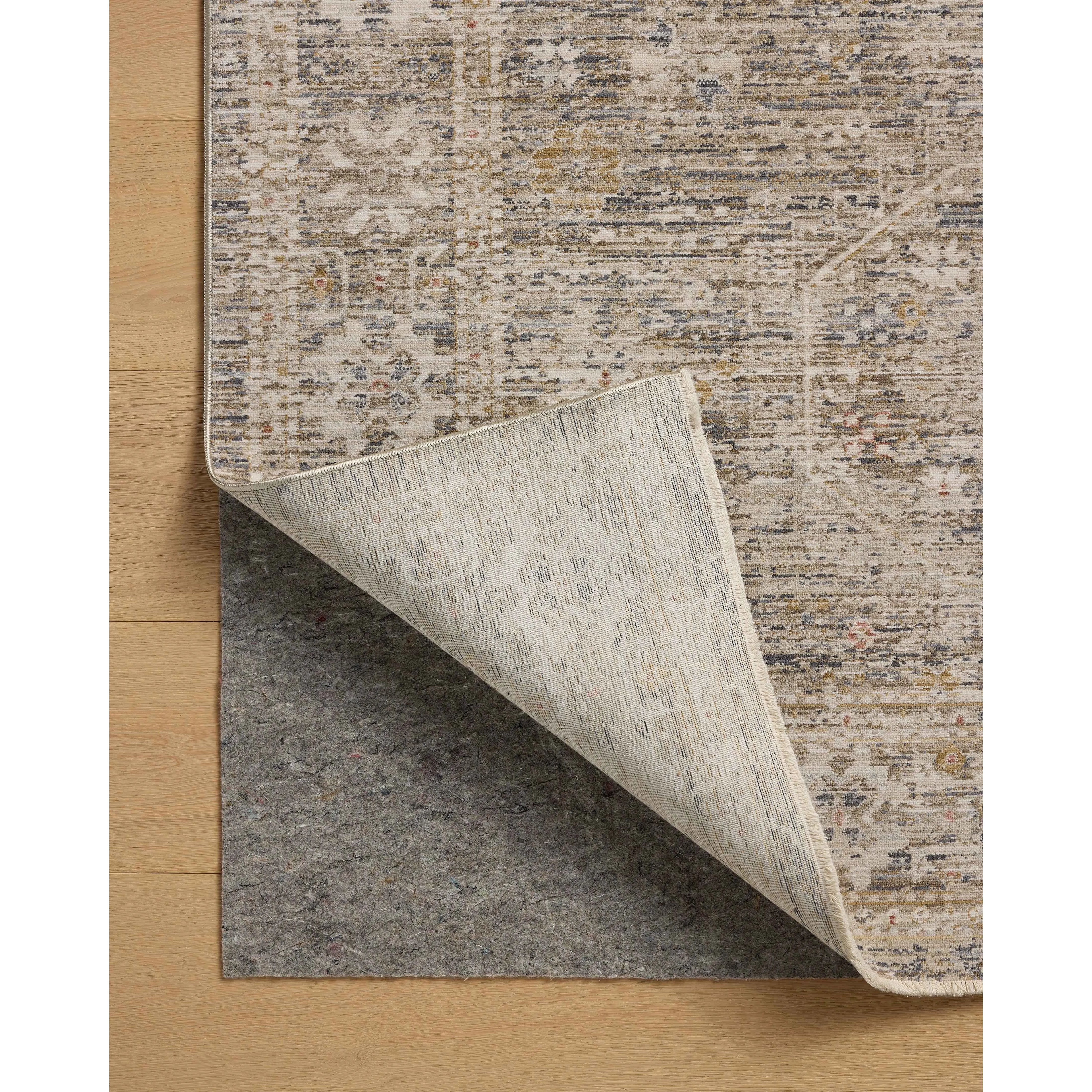 The Ida Collection from Chris Loves Julia x Loloi is a vintage-inspired area rug with a soft, subtly textured pile similar to hand-knotted rugs. The rugs gentle distressing creates a timeless look, while its durability and earthy colorways make it a great choice for the busiest rooms of the home, especially living rooms, kitchens, and hallways. Amethyst Home provides interior design, new home construction design consulting, vintage area rugs, and lighting in the Winter Garden metro area.
