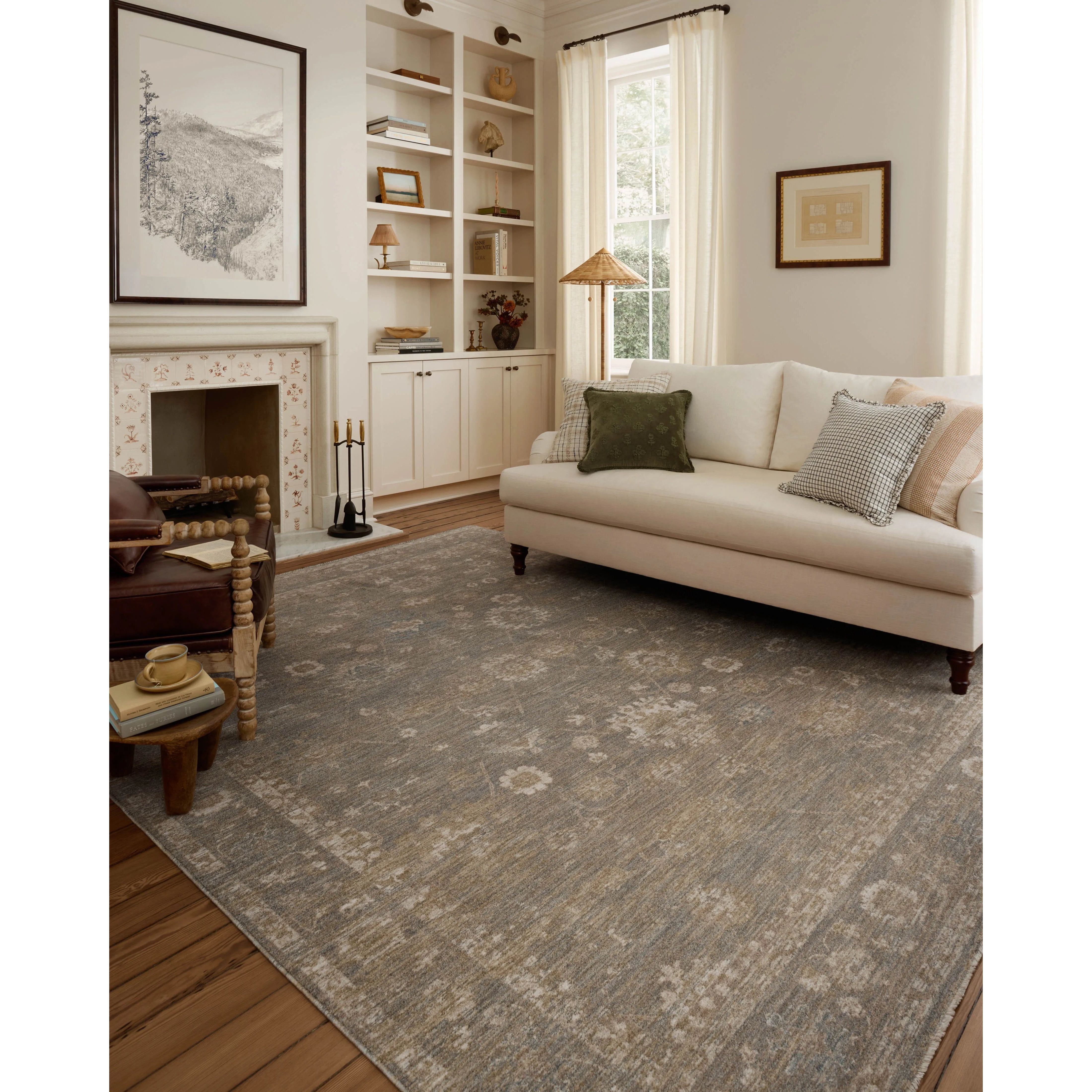 The Louisa Collection is a serene area rug based on beautiful, traditional Turkish designs updated in calm colorways by Chris Loves Julia in collaboration with Loloi. Pale blues, creams, and browns create a sense of softness, but so does the rugs pile, which is made of easy-to-clean, velvety polyester. Amethyst Home provides interior design, new home construction design consulting, vintage area rugs, and lighting in the Nashville metro area.
